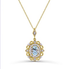 1/2 ct. Oval Aquamarine and Diamond Accent 14K Yellow Gold Pendant Necklace