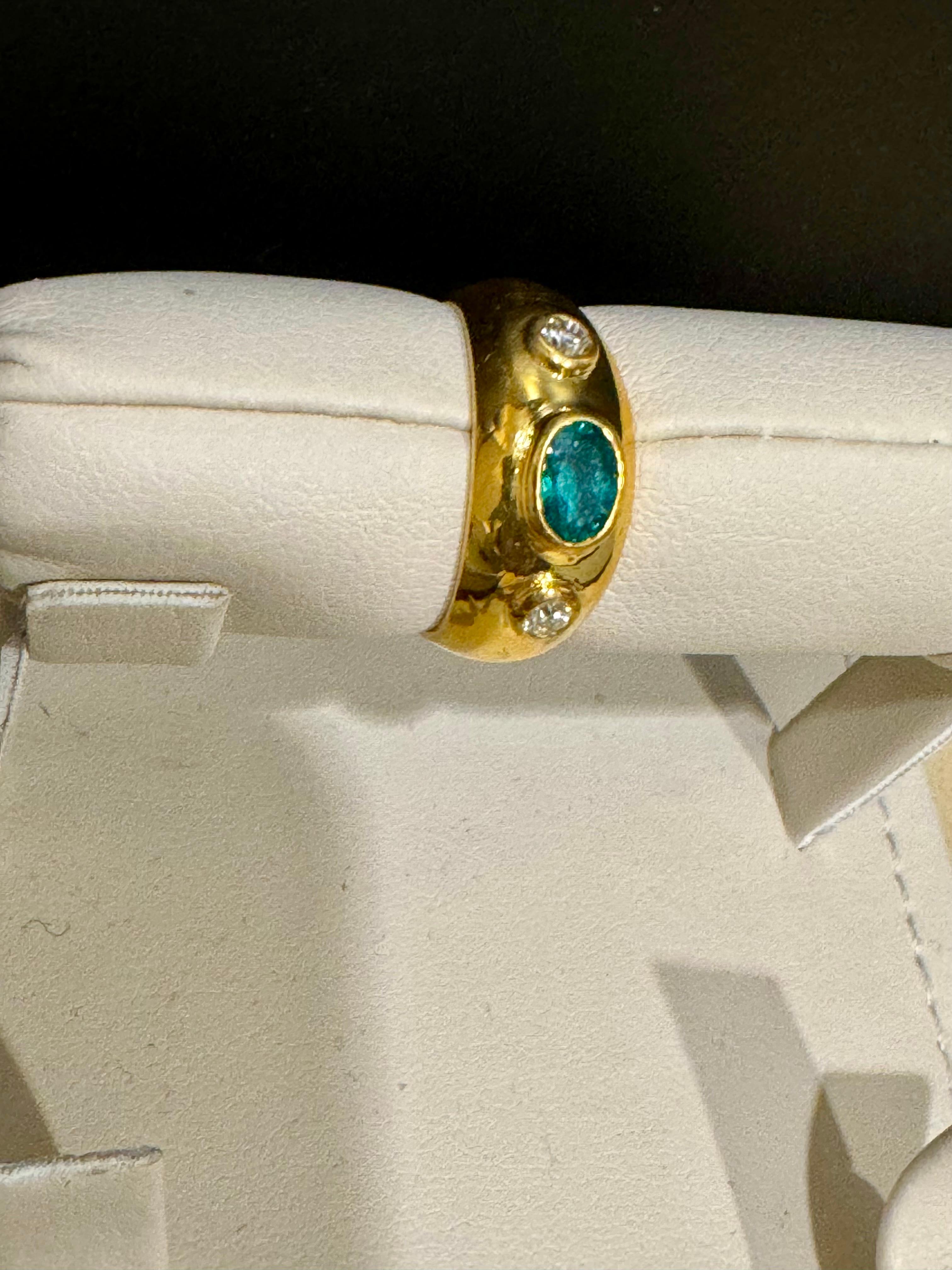 1/2 Ct Oval Emerald  &  Diamond Bezel Set Ring 18 Karat Yellow Gold,  Size 6.5
A nice simple band / ring
 Emerald 0.5 ct, 
Emeralds are very precious , Very Difficult to find and getting more more difficult to find.
Its a bezel set stone , no
