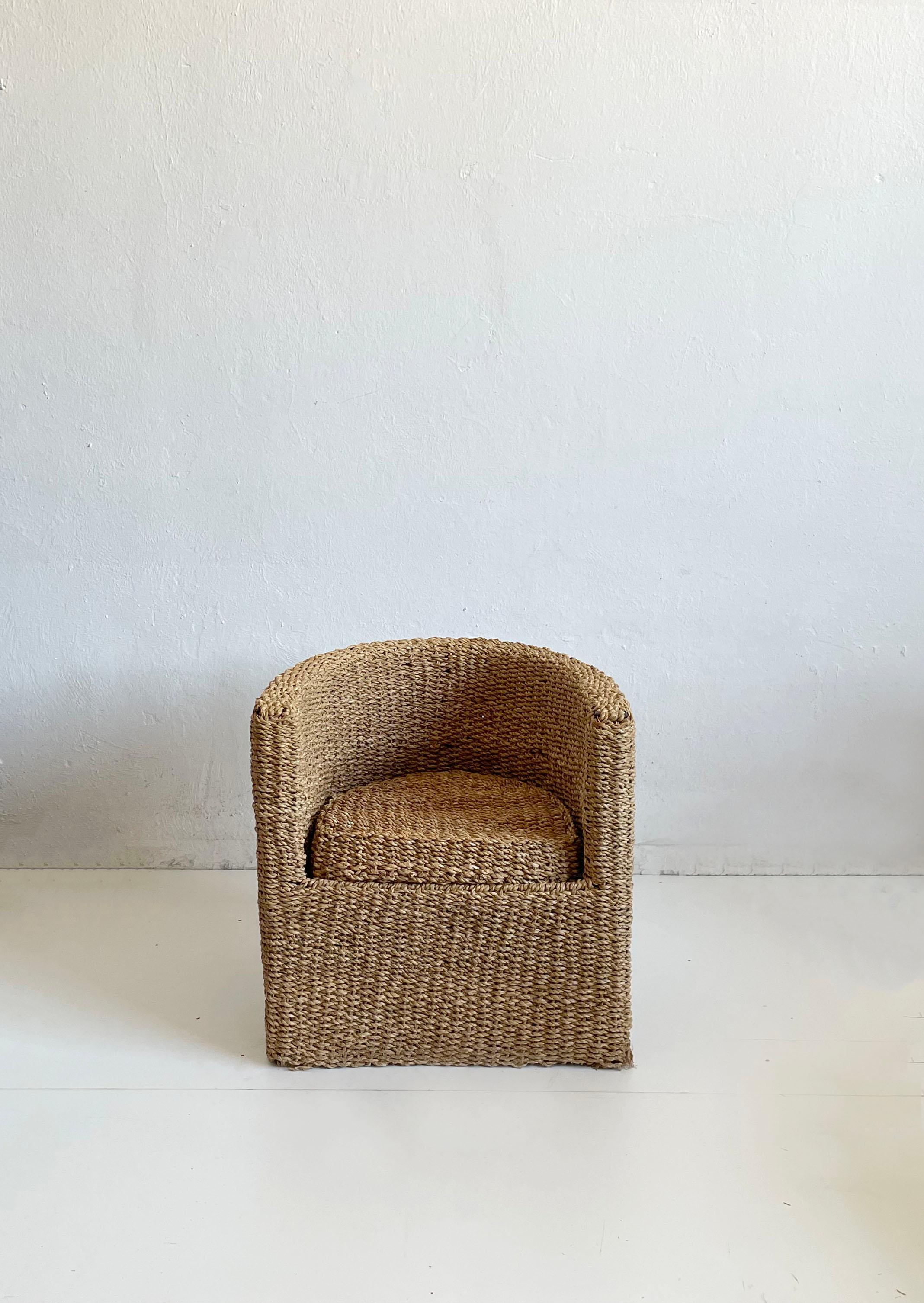 Handwoven Banana Leaf armchair made in Italy, c the 1970s - 1980s 

Two chairs are available, price is for one

The chairs have a sturdy metal supportive structure that keeps them very stable. 
The metal structure is fully covered and just a