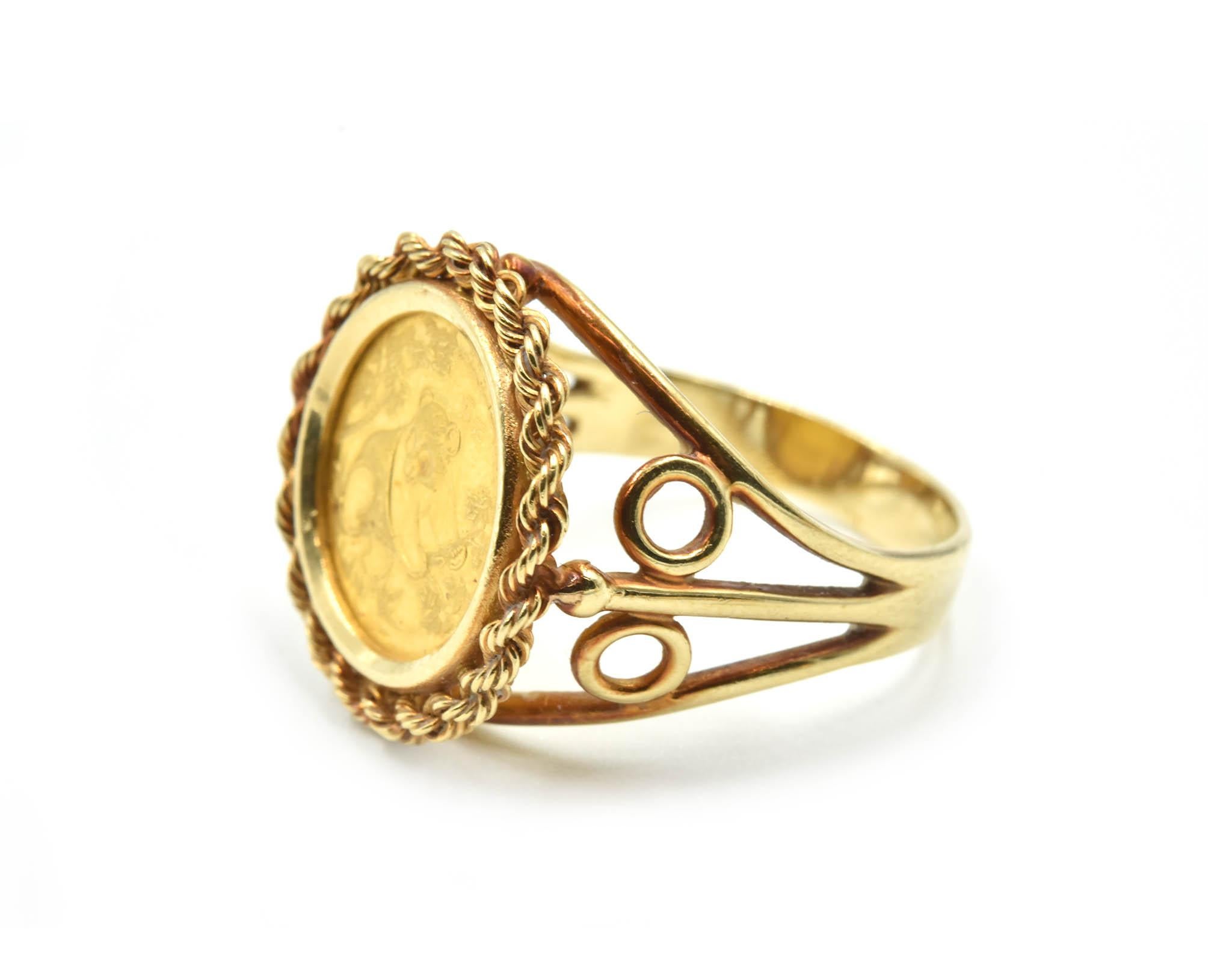 Designer: custom design
Material: 14k yellow gold
Dimensions: ring top measures 3/4-inches in diameter
Ring Size: 8 1/4 (please allow two additional shipping days for sizing requests)
Weight: 5.90 grams
