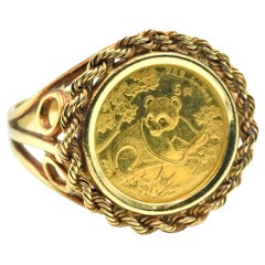 bague avec pièce de monnaie 1/2 panda en or jaune 14 carats