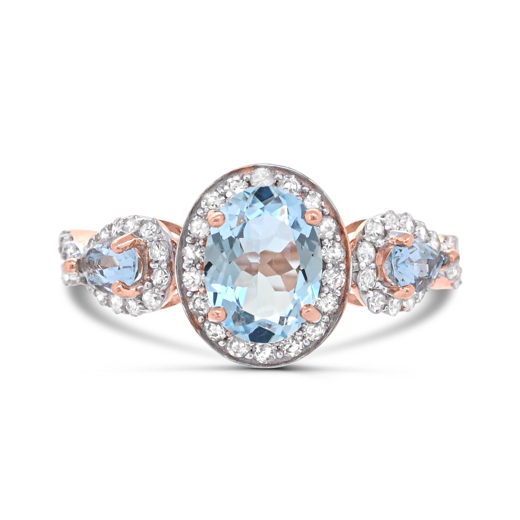 Indulge in the elegance of our Oval & Pear Cut Aquamarine & Diamond Accent 14K Rose Gold Ring. Crafted with meticulous attention to detail, this ring boasts a stunning combination of one oval-cut and two pear-cut aquamarine  accented by sparkling