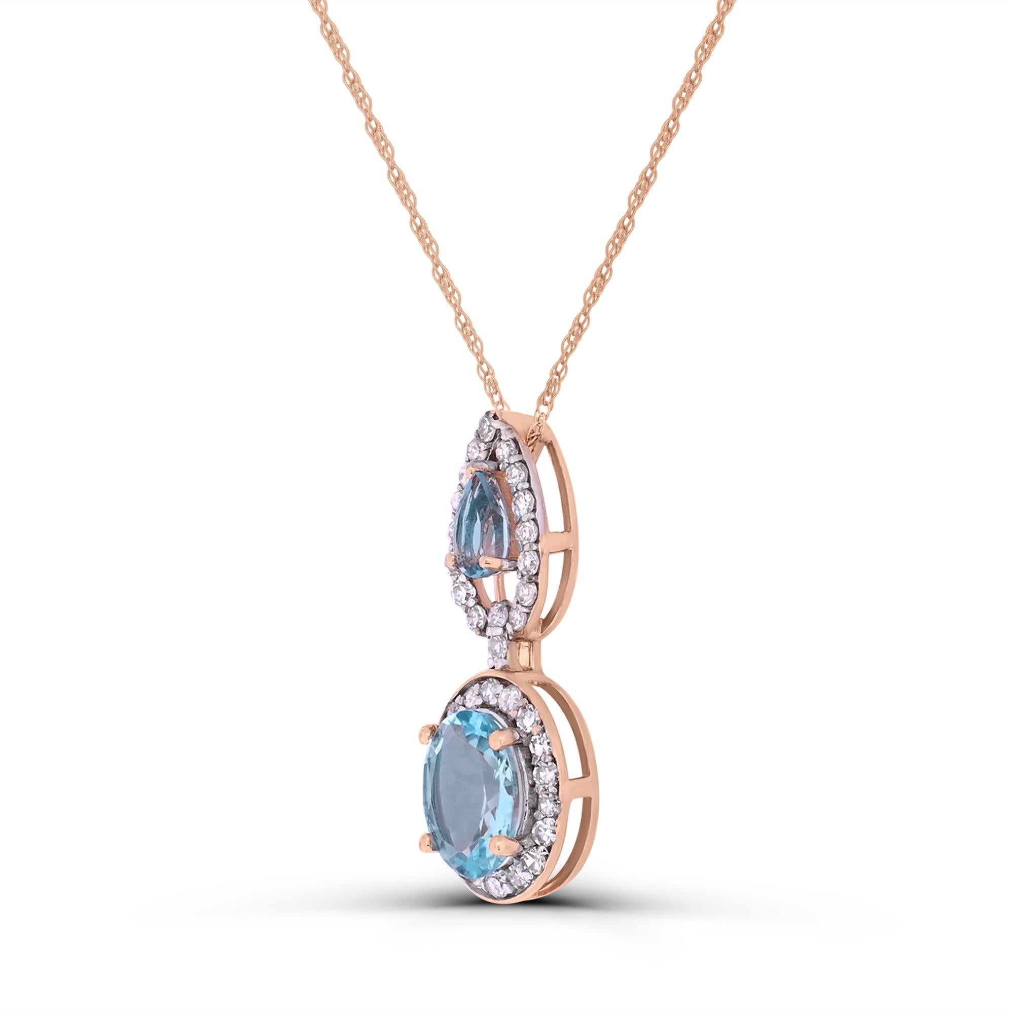 Indulge in the elegance of our Aquamarine and White Diamond Drop Pendant Necklace in 14K Rose Gold. Crafted with meticulous attention to detail, this necklace boasts a stunning combination of one oval-cut and one pear-cut aquamarine accented by