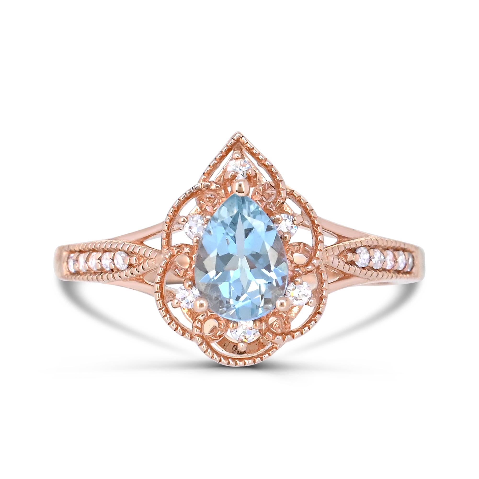 Indulge in the elegance of our 1-3/4 Carat Aquamarine and Diamond Accent 14K Rose Gold Ring. Crafted with meticulous attention to detail, this ring boasts a stunning combination of one pear-cut aquamarine accented by sparkling round A-quality white