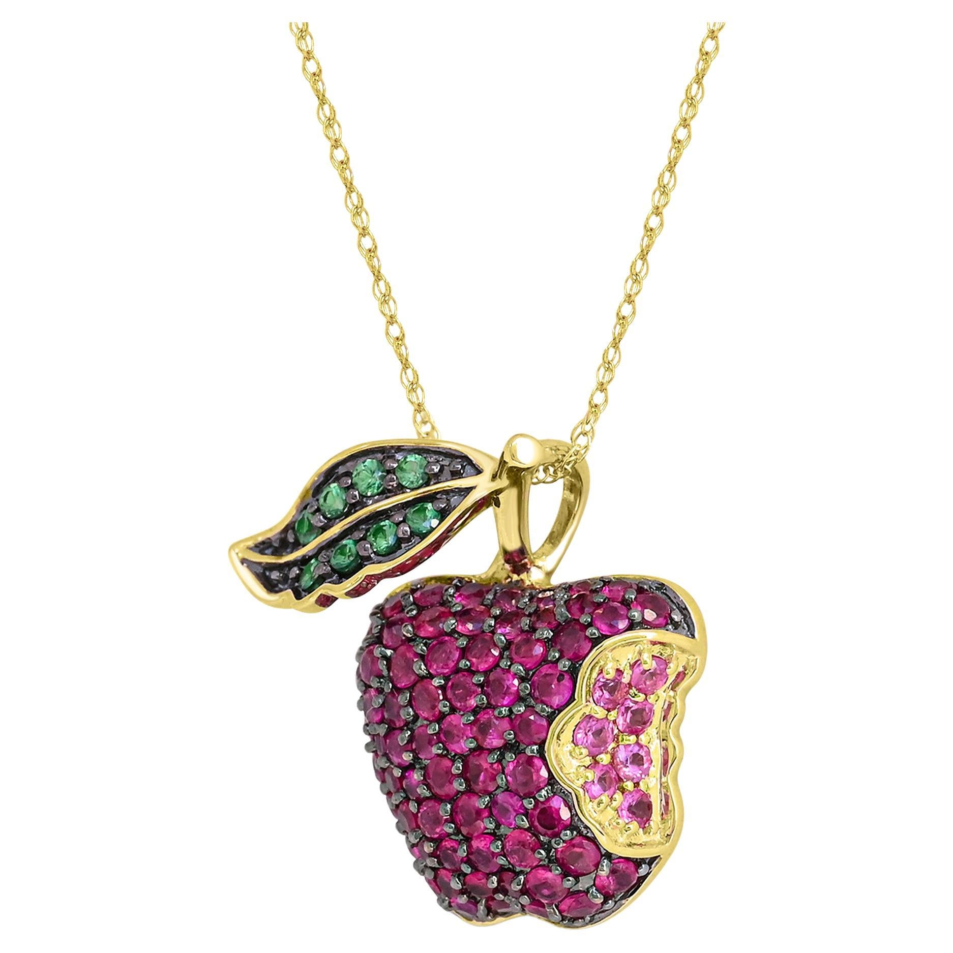 Indulge in the adorable beauty of our Ruby, Tsavorite and Pink Sapphire Apple Pendant Necklace in 14K Yellow Gold. This exquisite piece features cluster setting of round-cut rubies accented by pink sapphire and tsavorite gemstones, delicately set in