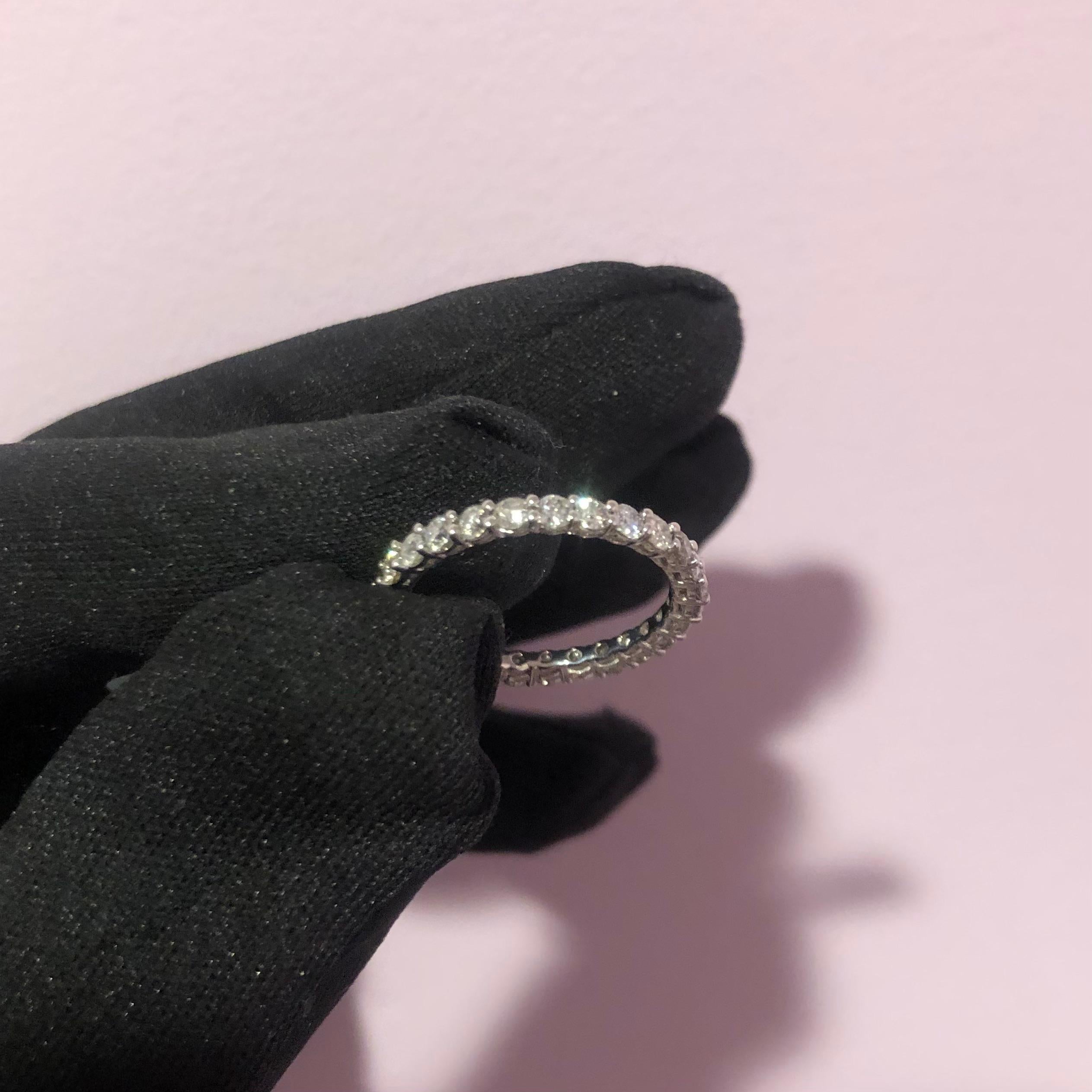 Classic 1 3/5 carat round diamond full eternity band ring in 14k white gold. 27 round brilliant diamonds (SI-I clarity) are hand set in this full eternity band weighing approx. 1.60 carats. 


This eternity diamond band sparkles beautifully in the