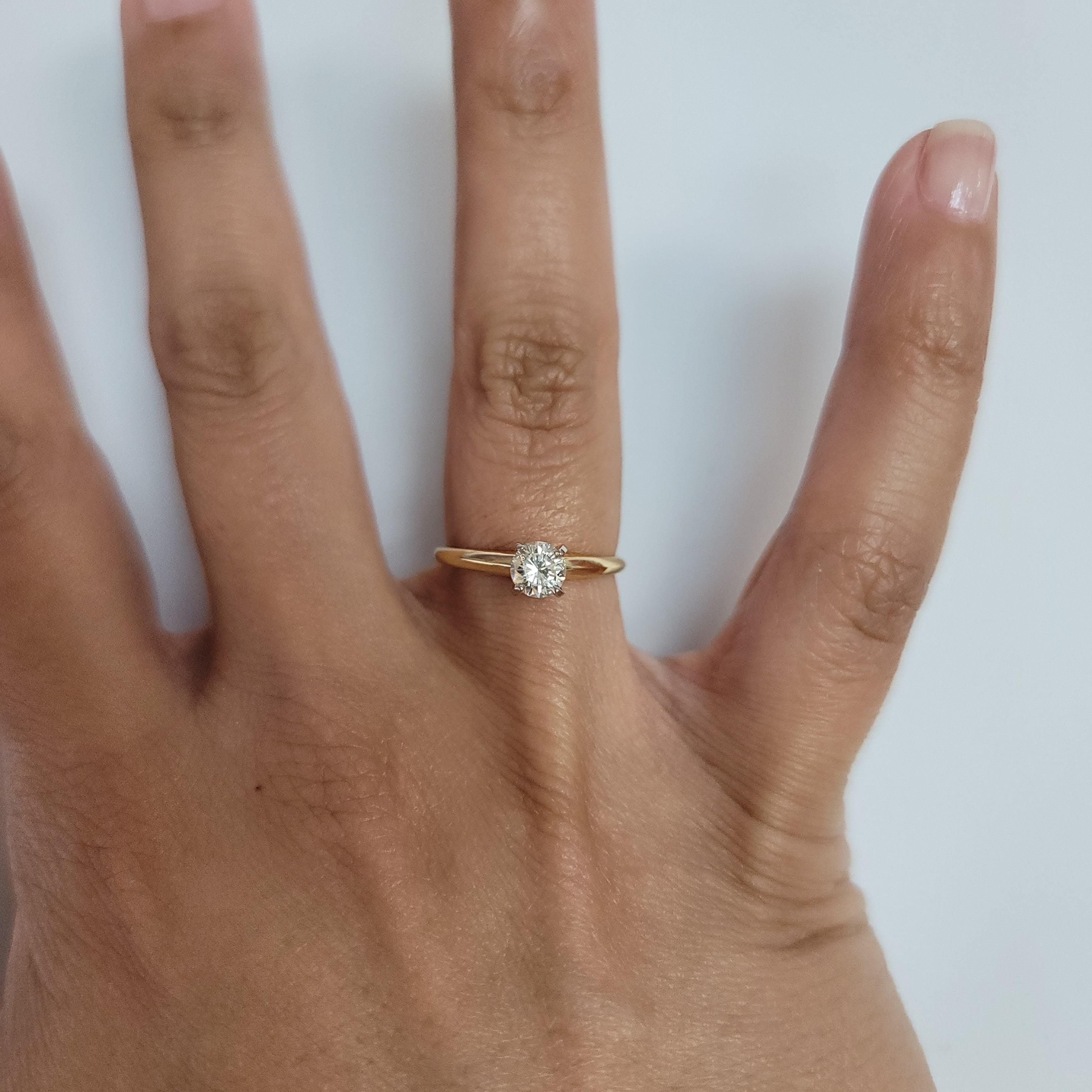 ♥ Product Summary ♥

Main Stone: Diamond
Approx. Diamond Carat Weight: .33cttw
Diamond Clarity: VS2
Diamond Color: G
Diamond Cut: Round 
Prong Material: 14k White Gold
Band Material: 14k Yellow Gold
Setting: Four-Prong
Size: 6.25

Diamonds and