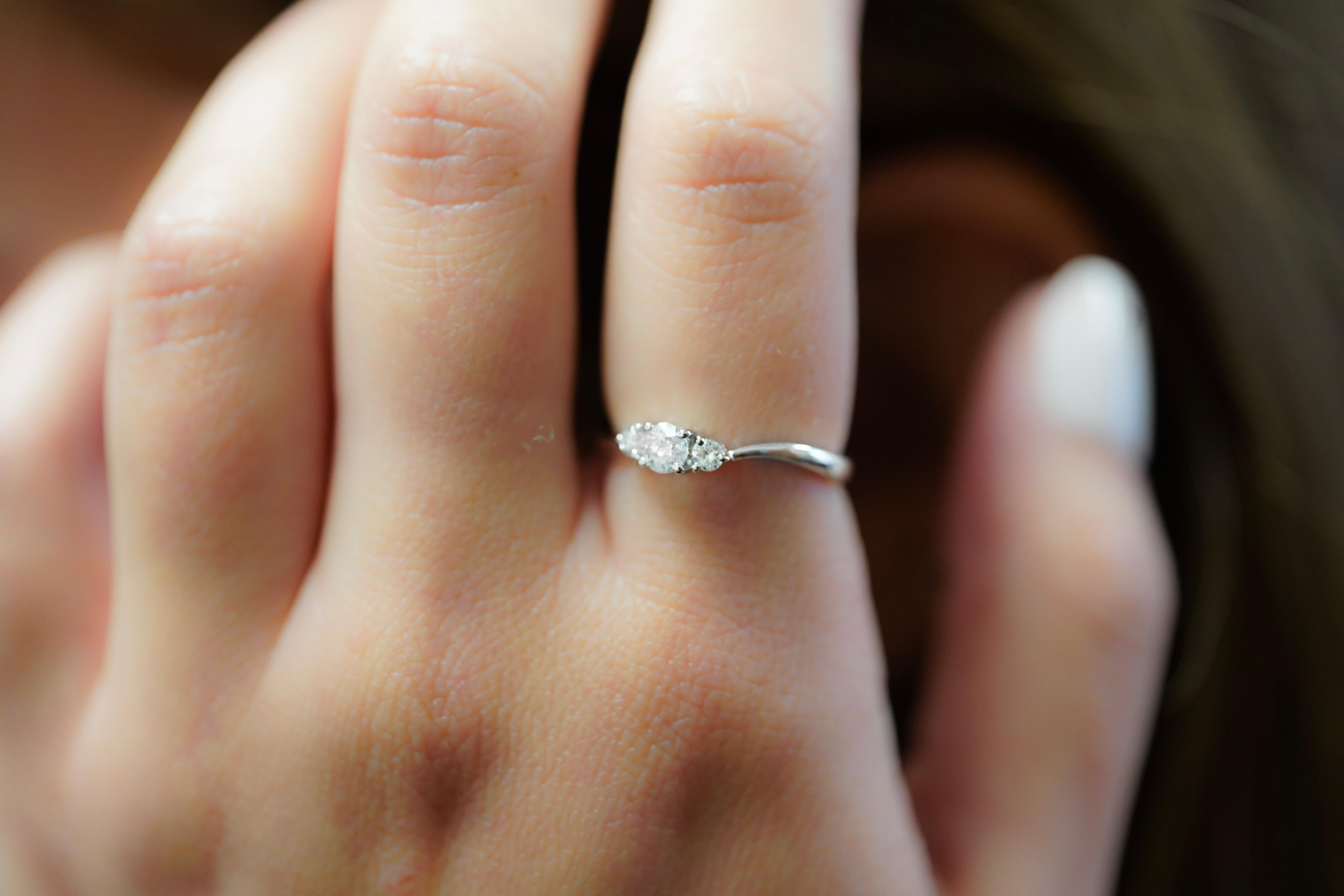 Women's 1/3 Carat TW Natural Diamond Mini 3-Stone Curved Ring in 14K White Gold For Sale