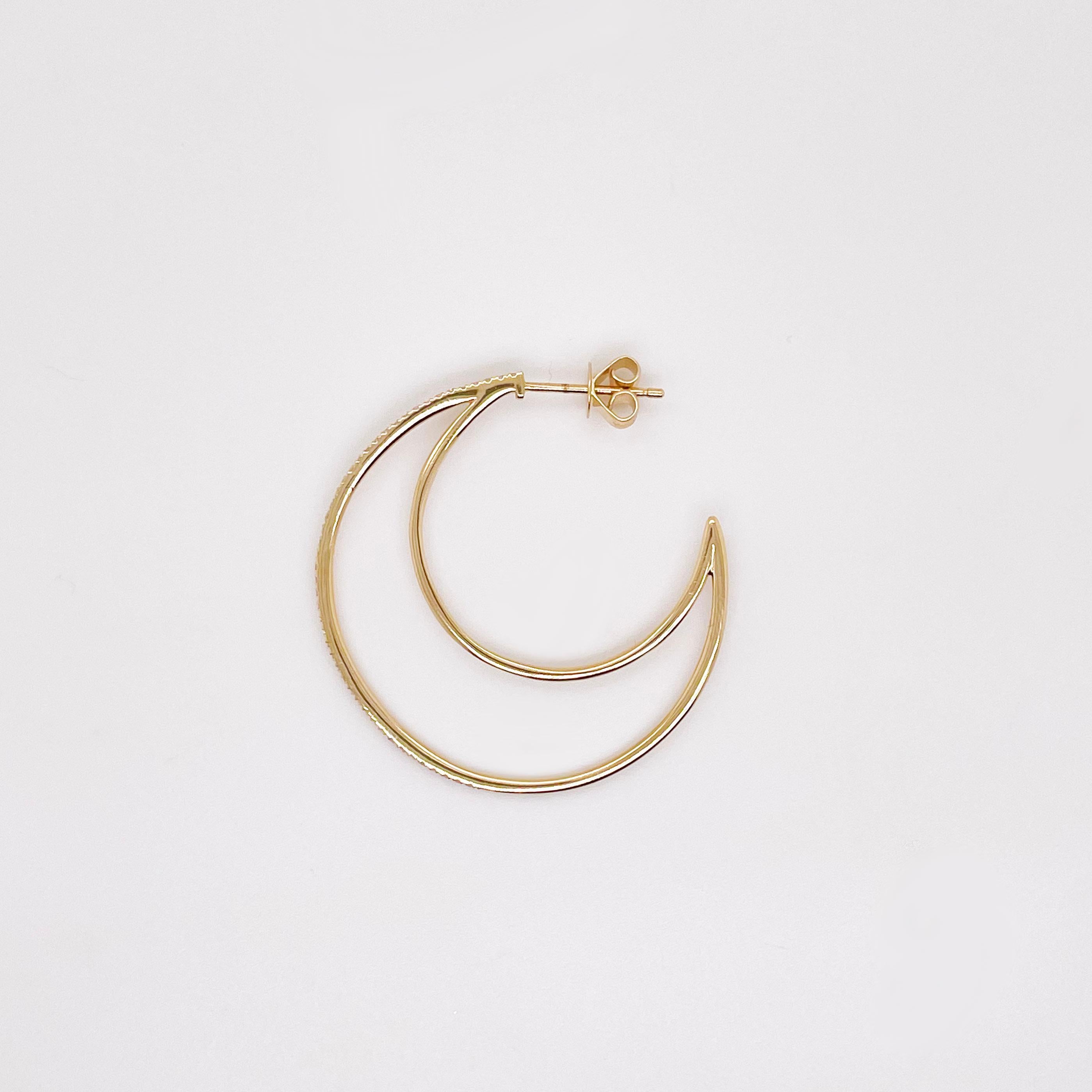 Stunning diamond hoop earrings with new, unique design! Our hoop earrings have round brilliant, natural genuine diamonds set on the front of the earrings. The earring profile has a crescent moon shape that's solid 14k yellow gold that is lightweight