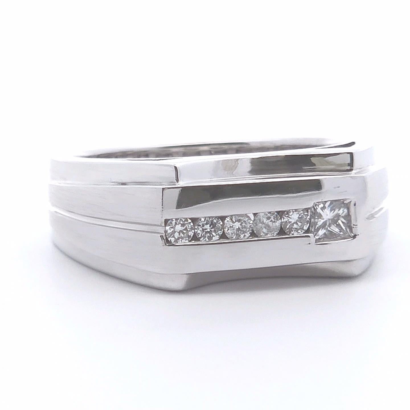 Introducing our 1/4 Carat Diamond Men’s Ring in 14k Gold. This men’s ring features a 1/4 carat round-cut diamond, elegantly set in 14k gold. The diamond is positioned centrally in a sleek, polished band that adds a refined touch to the overall