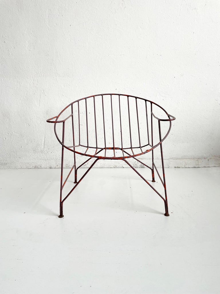 Vintage French artisanal garden chair from the 1950s

Handcrafted, made of wrought iron, painted in red color

4 chairs are available, price is for one chair

The chairs remain in very good vintage condition, with lots of beautiful old