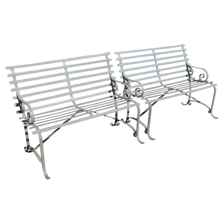 1 Antique metal outdoor patio bench.

This charming outdoor or patio bench has a natural oxidized finish. The bench has a slatted curved seat with scroll details on the arms.

We have 2 available.
 