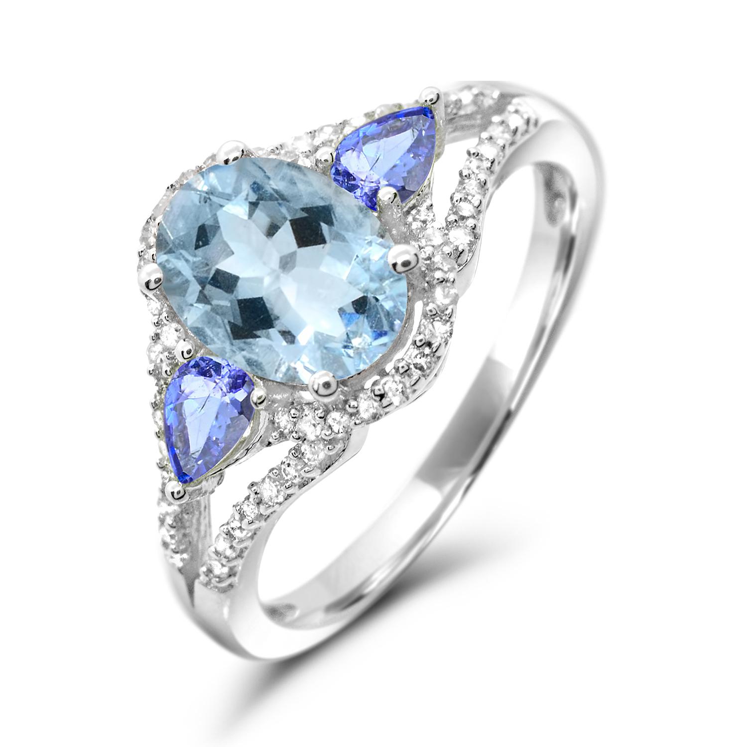 Indulge in the elegance of our Oval-Cut Aquamarine and Pear-Cut Tanzanite with White Diamond Accented Ring. Crafted with meticulous attention to detail, this ring boasts a stunning combination of Aquamarine and Tanzanite accented by sparkling white