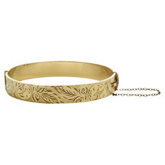 1/5th 9ct Rolled Gold Scroll and Leaf Engraved Bangle Bracelet stamped AJ