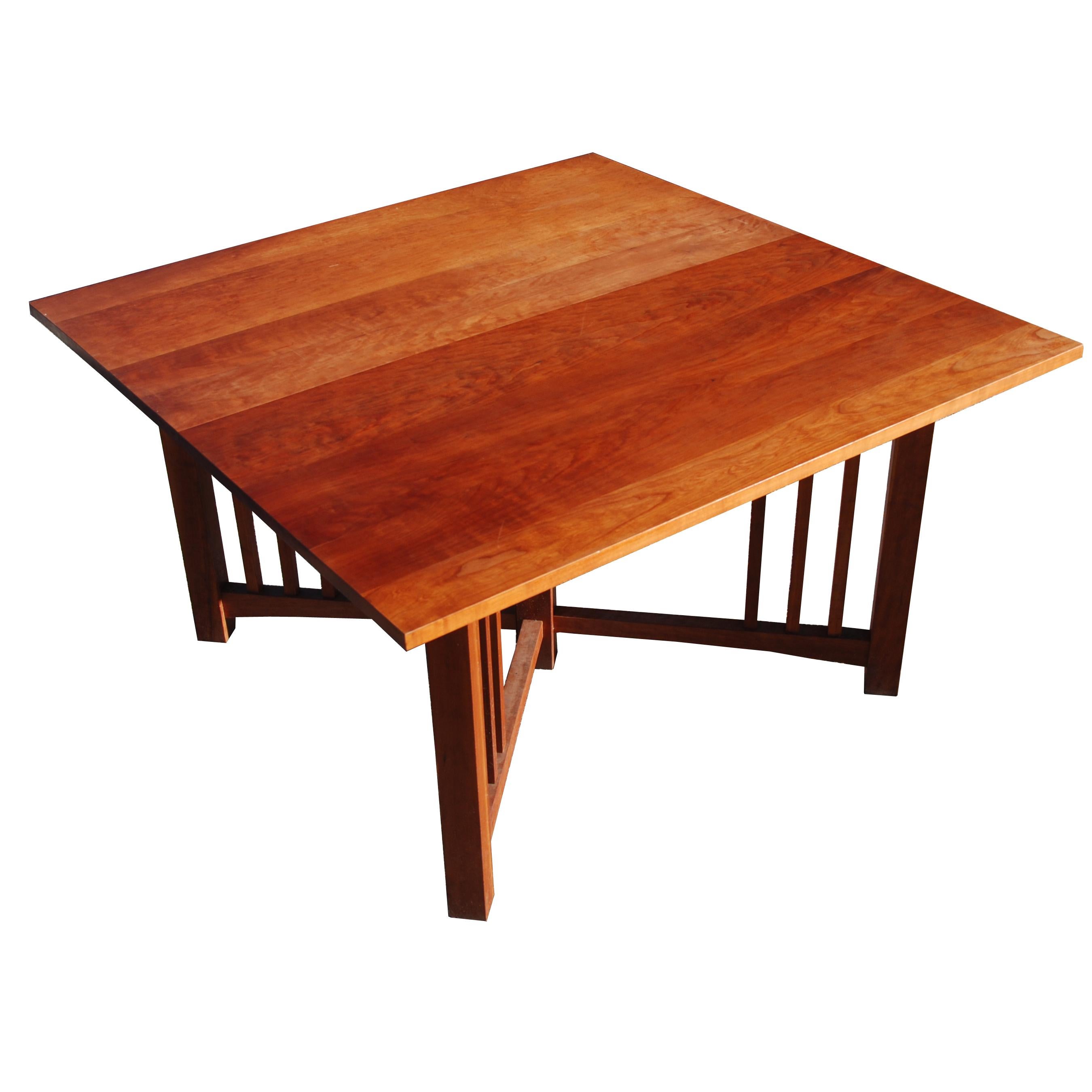 This is a Thomas Moser Arts and Crafts style trestle table. It's extendability makes it perfect as a breakfast table or as a dining table. It's constructed of fine cherry wood and has the signature Thomas Moser craftsmanship.

We also have a 52'