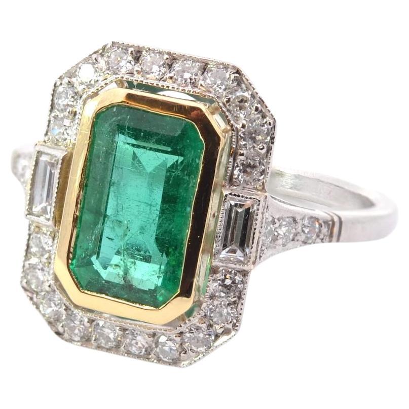 1, 79 carats emerald and diamonds ring in platinum and 18k gold For Sale