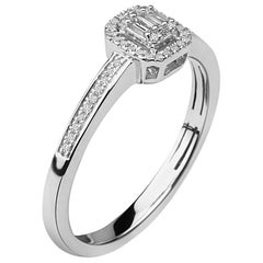 Vintage 1/8 Carat Baguette Center & Round Halo Diamond Ring in 14 Karat White