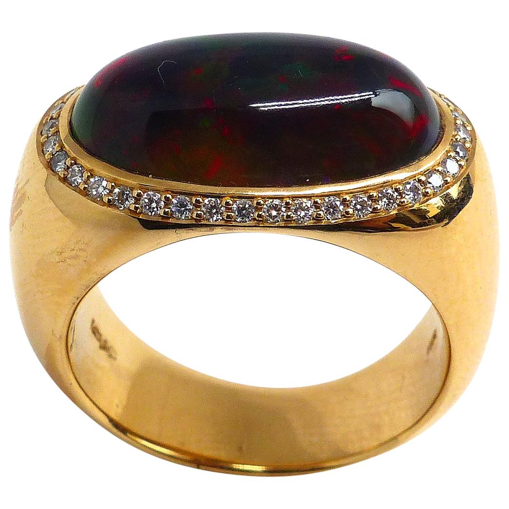 Ring in Rose Gold with 1 Black Opal Oval and 38 Diamonds 