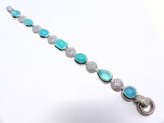 Bracelet en platine avec 7 cabochons de tourmaline Paraiba 27, 07 carats + diamants