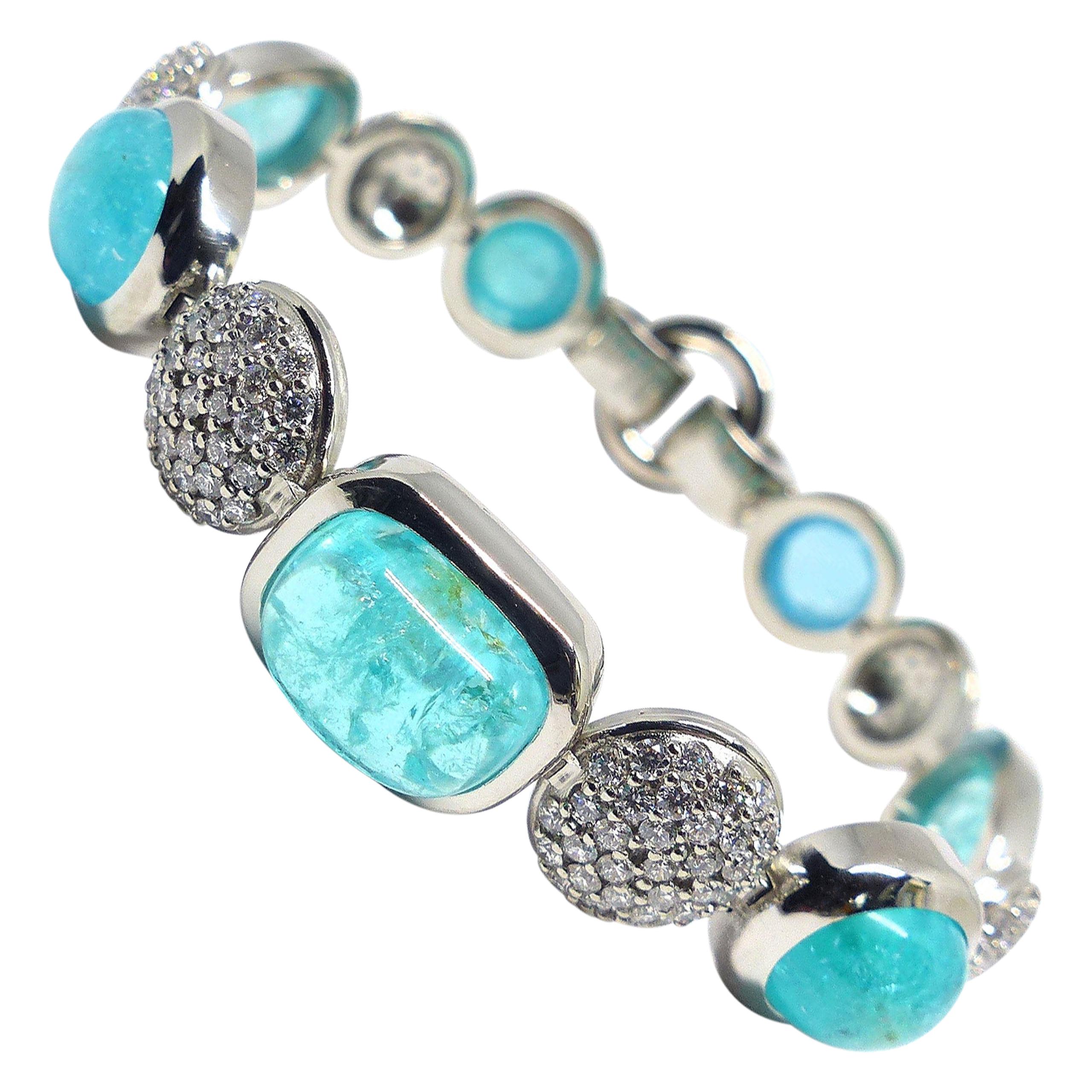 Bracelet in Platinum with 7 Paraiba Tourmaline Cabouchons 27, 07ct. + Diamonds  For Sale