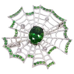 Brooch in White Gold with 1 Chrome Tourmaline and Tsavorites and Diamonds 