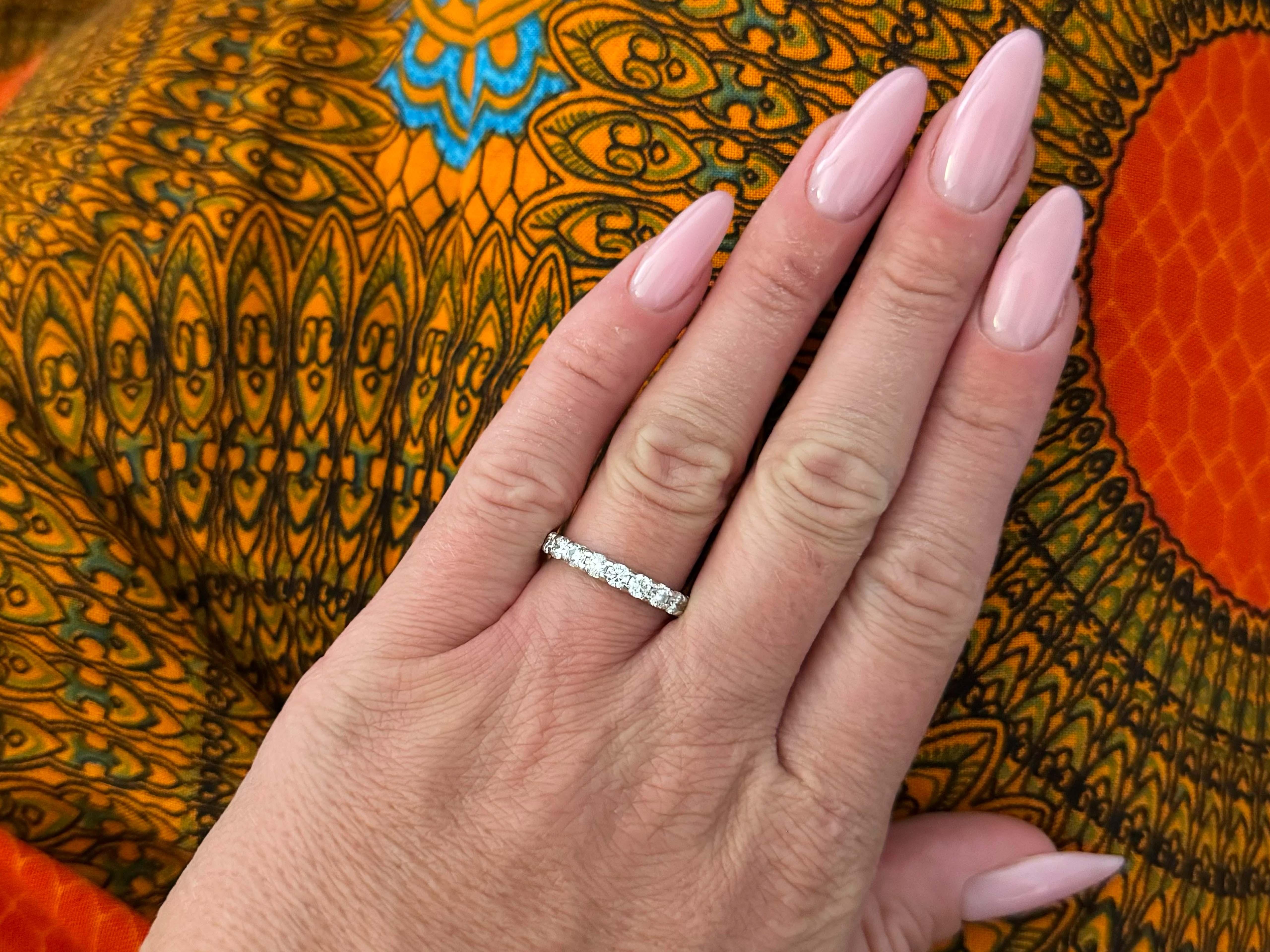 Item Specifications:

Metal: 14k White Gold

Diamond Count: 11 brilliant cut

Total Diamond Carat Weight: ~1.00 carats 

Diamond Color: H-J

Diamond Clarity: SI1-SI2

Ring Size: 7

Total Weight: 2.9 Grams

Stamped: 
