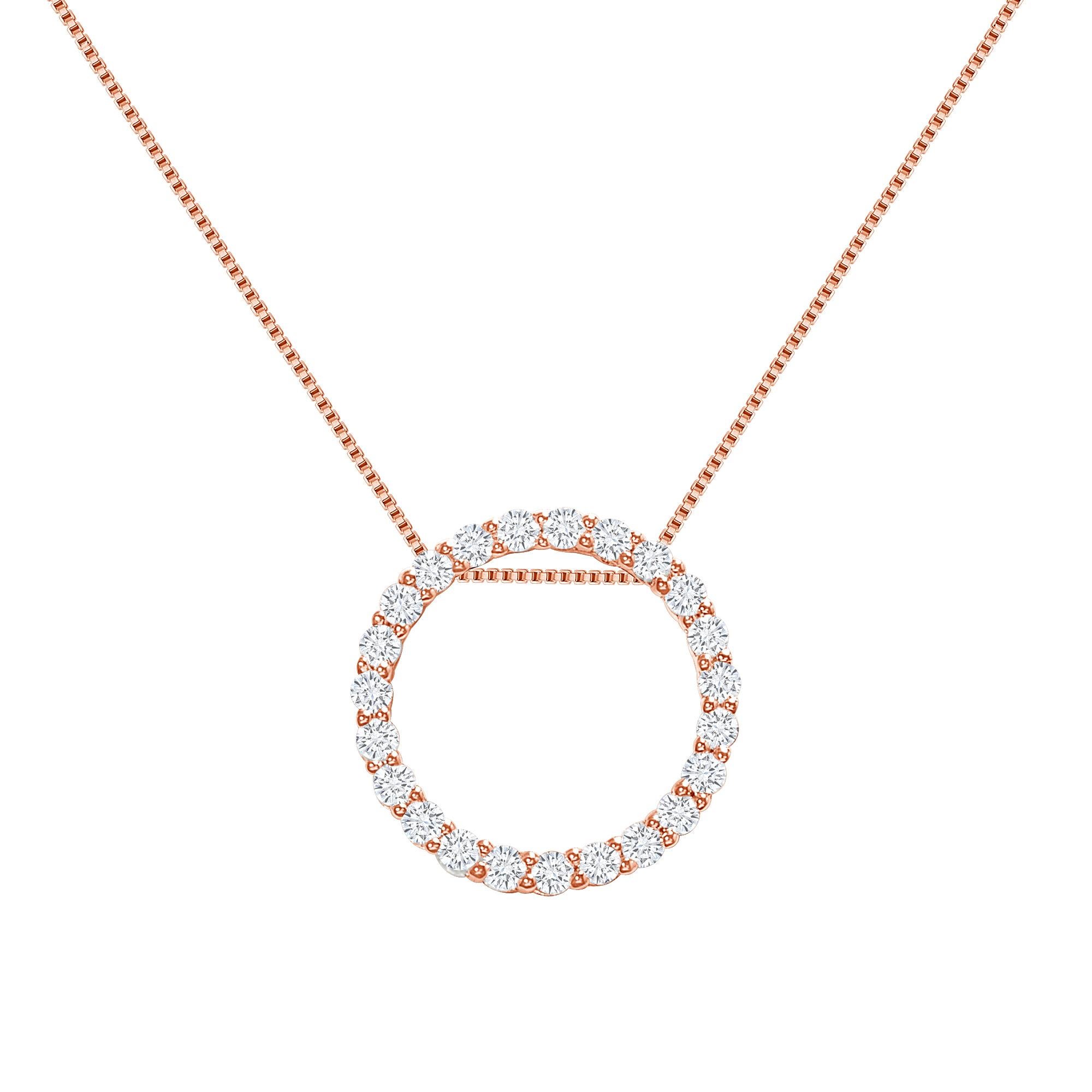 This diamond circle pendant provides a glowing chic look.
Metal: 14k Gold
Diamond Total Carats: 1 carat
Diamond Cut: Round Natural Diamonds (Not Lab Grown)
Diamond Clarity: VS
Diamond Color: F-G
Color: Rose Gold
Necklace Length: 16 inches