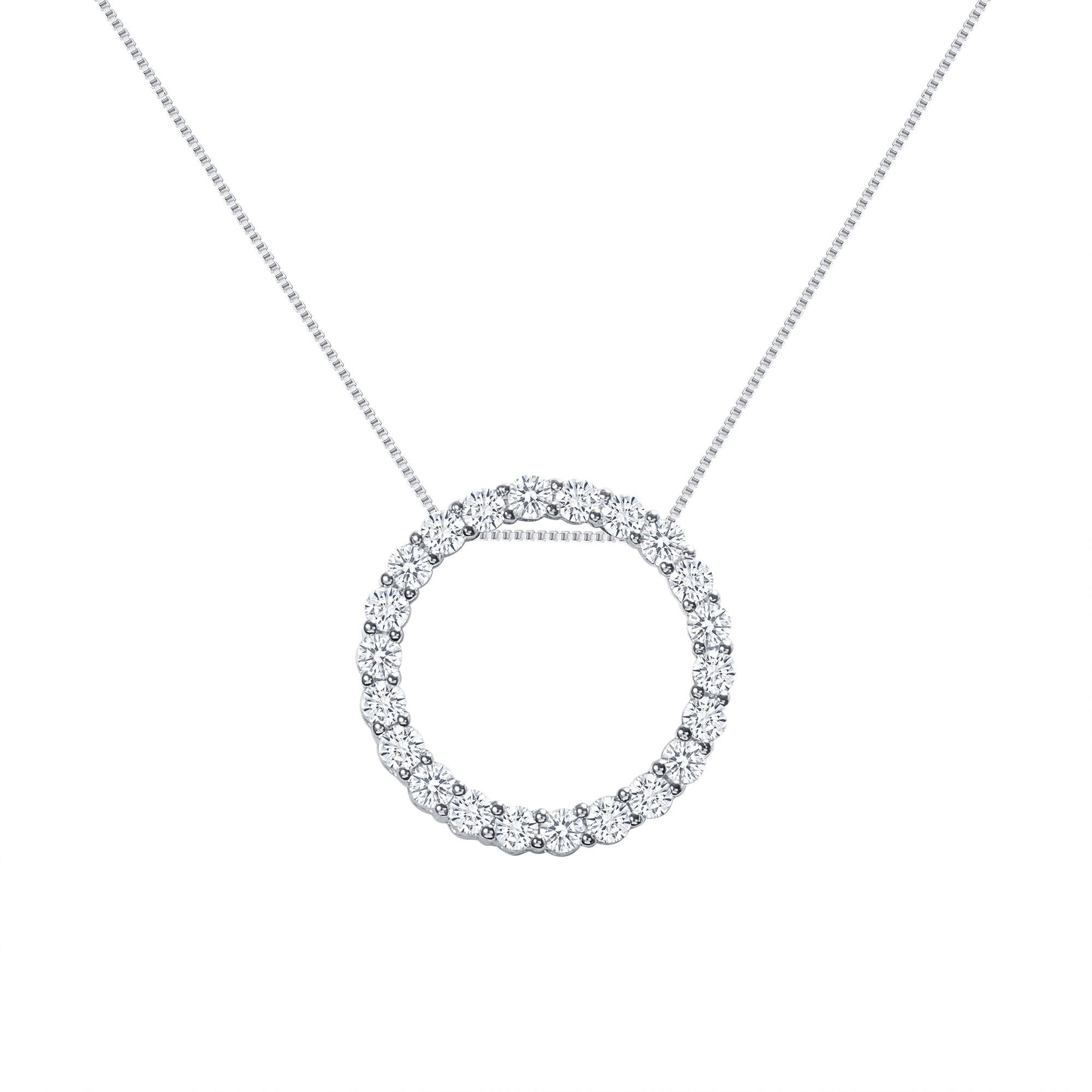 This diamond circle pendant provides a glowing chic look.
Metal: 14k Gold
Diamond Total Carats: 1 carat
Diamond Cut: Round Natural Diamonds (Not Lab Grown)
Diamond Clarity: VS
Diamond Color: F-G
Color: White Gold
Necklace Length: 18 inches
