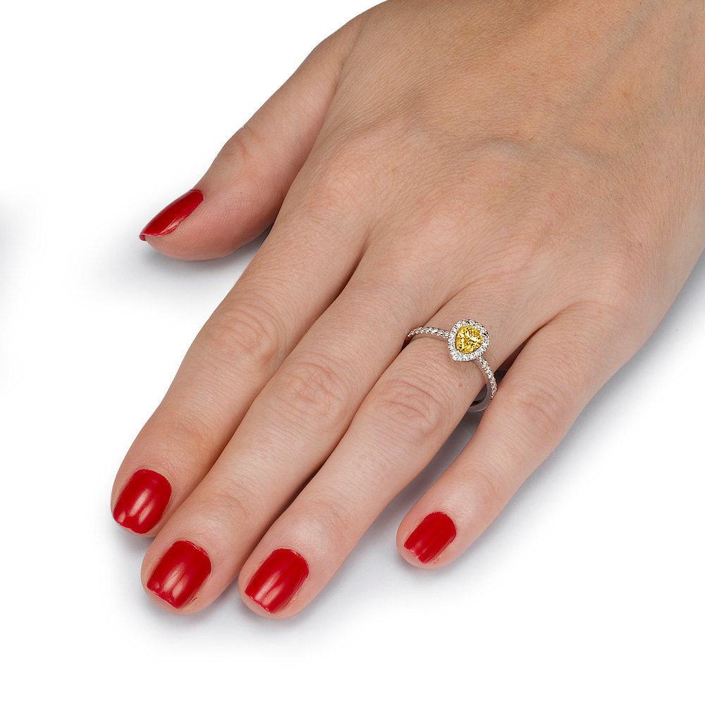 pear shaped yellow diamond engagement ring