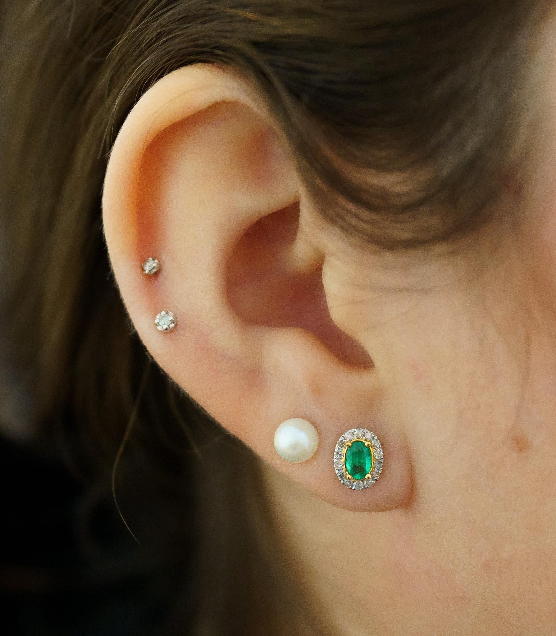 Women's 1 Carat 5mm Oval Emerald & Diamond Halo Stud Earrings in 18k White Gold For Sale