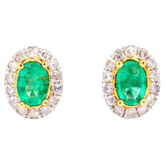 1 Carat 5mm Oval Emerald & Diamond Halo Stud Earrings in 18k White Gold