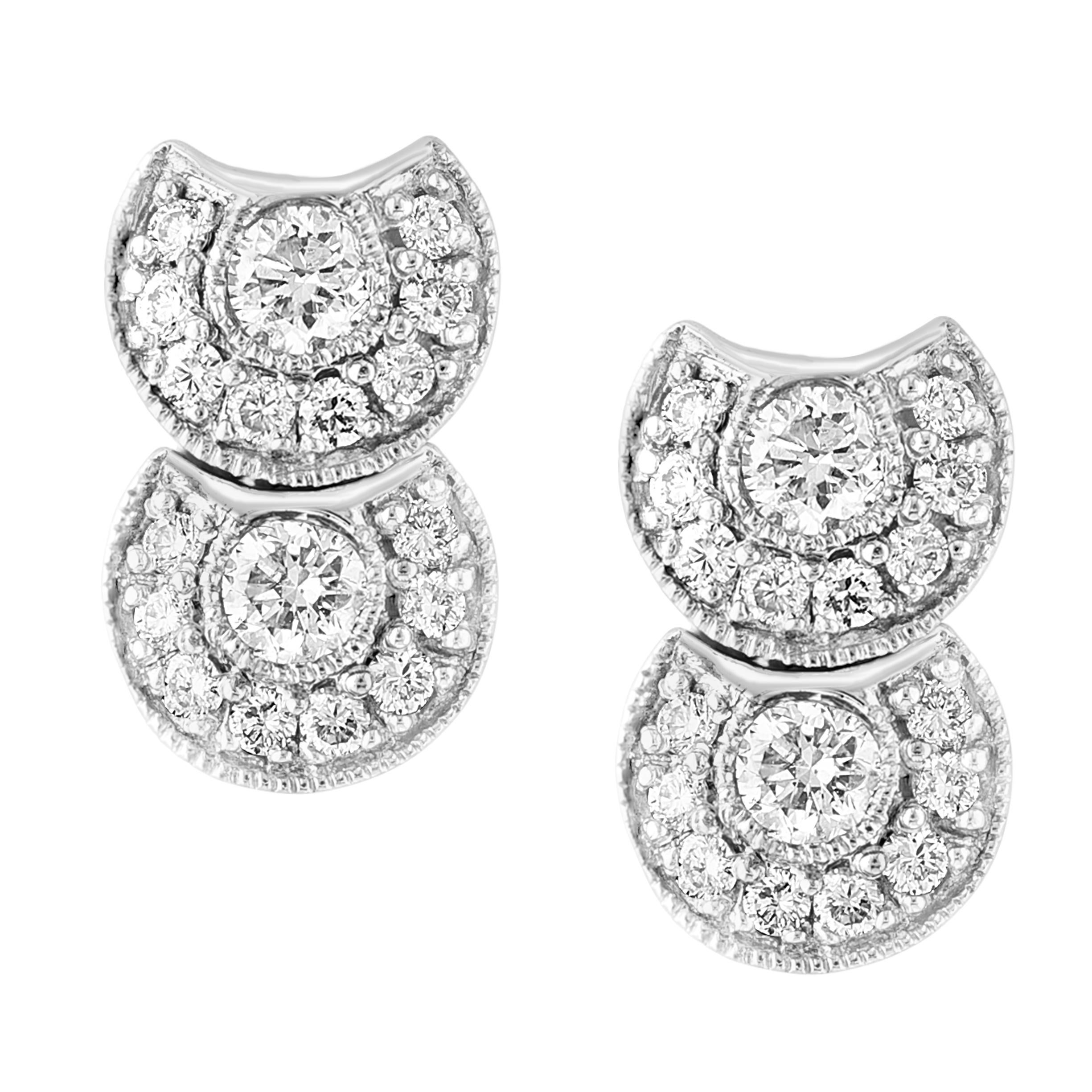 Add a touch of sweet and shimmery style to any day of the week with these beautiful stud earrings. These earrings feature clusters of round brilliant-cut diamonds, totaling 1.0 carat in weight. Set in 14 karat white gold, these diamond cluster stud