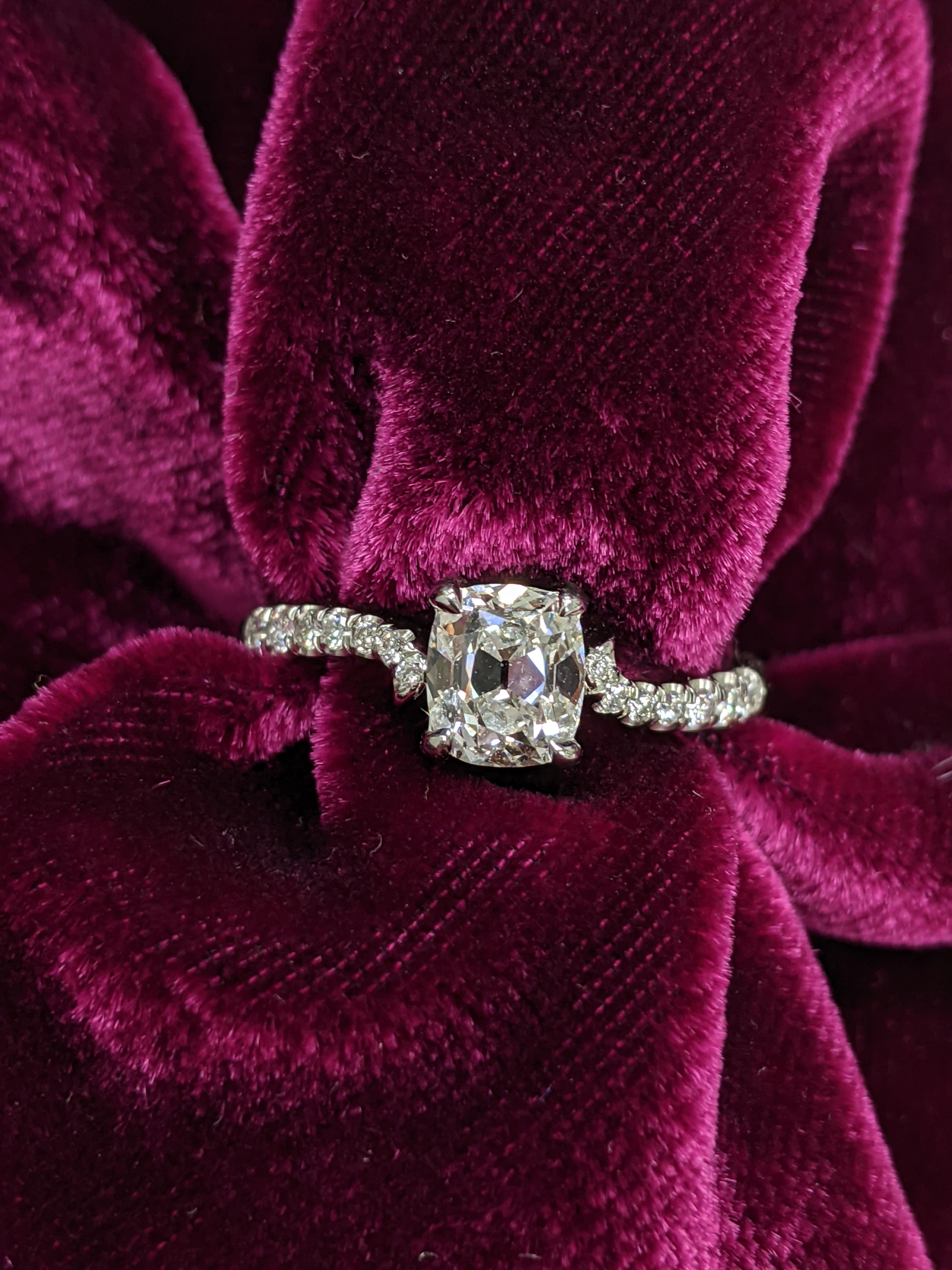 1.00 ct Cushion with F color and SI-1 clarity (GIA upon request) is mounted on a solitaire that is 