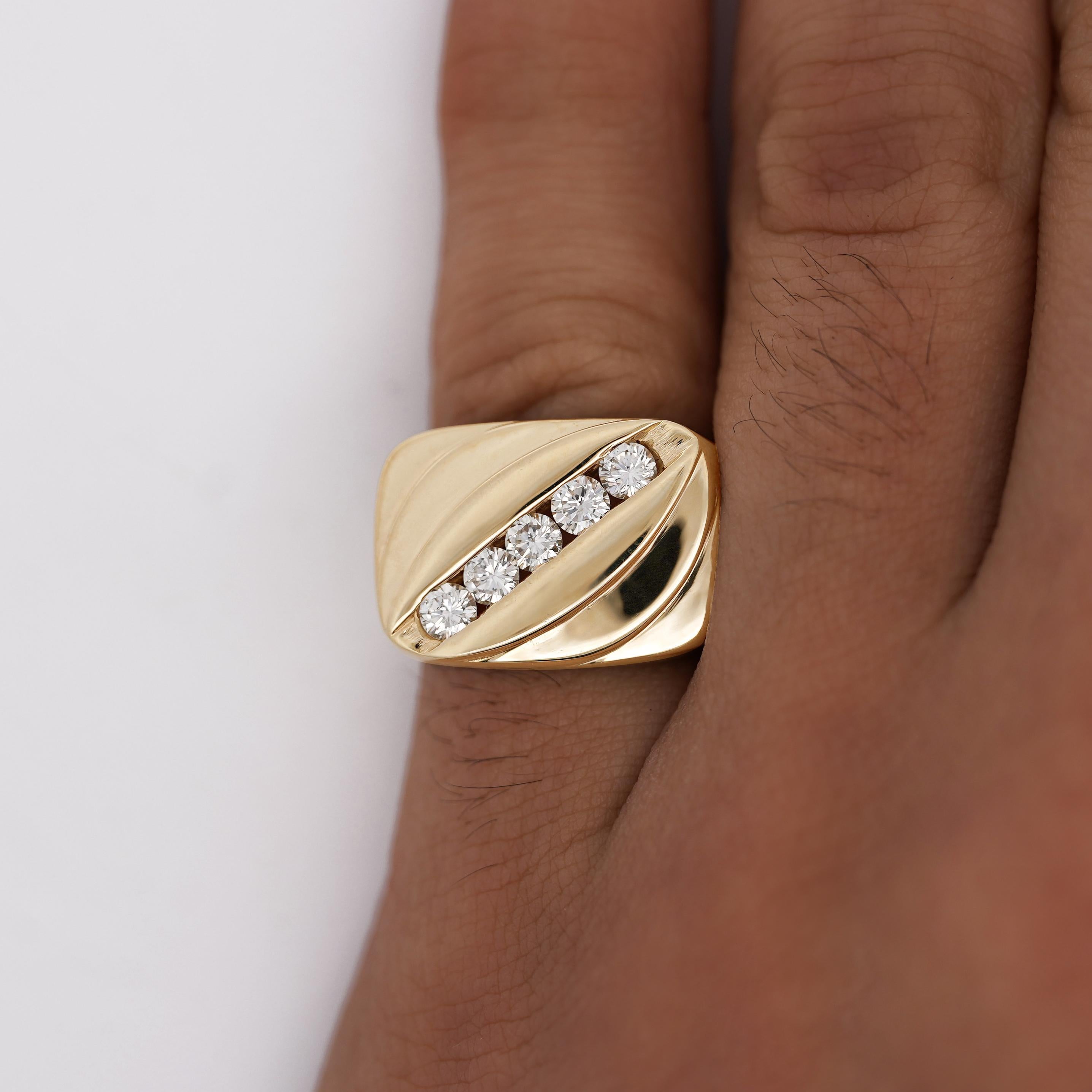 This bold and sophisticated 14K yellow gold men’s ring features a vintage sculpted design, highlighted by a diagonal channel set with five sparkling round-cut diamonds.

Details:
Item Type: Men's Ring
Metal: 14K Yellow Gold
Size: 6
Ring Face
