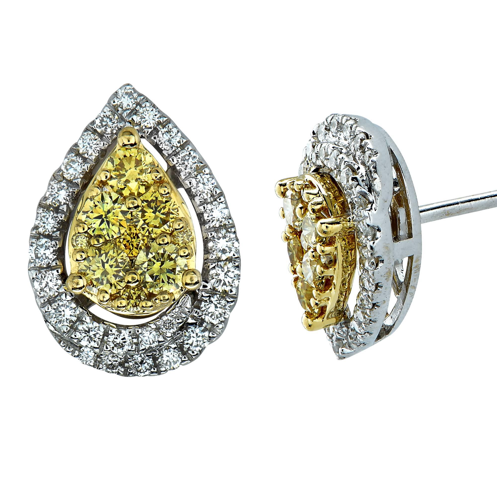 18k white and yellow gold pear shape earrings featuring 70 round brilliant cut yellow and G color VS clarity diamonds weighing approximately 1ct total. These earrings measure 12.4mm x 9.2mm.

Our pieces are all accompanied by an appraisal performed