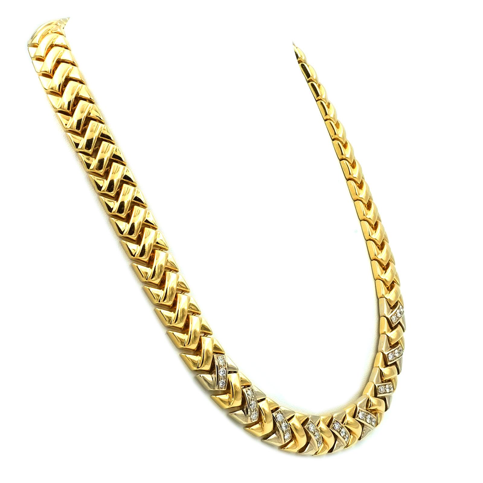 1 Carat Diamond 18K Gold Choker Necklace

Sporty, elegant diamond necklace made of high-carat gold in solid workmanship. The broad, flat-fitting collar, made of waved links, is set on the front with 27 brilliant diamonds of 1 ct in total. Like a