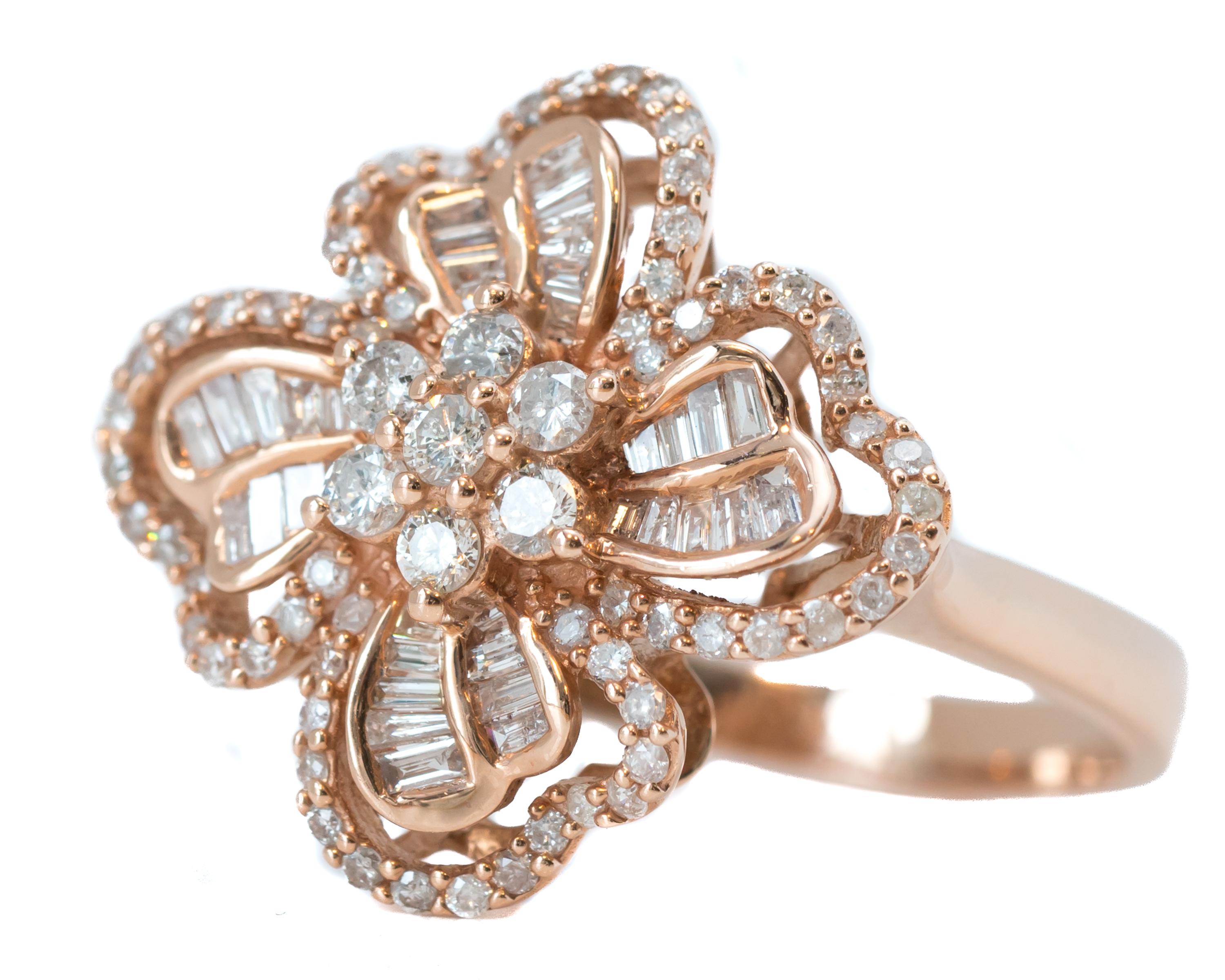 Features:
1 carat total Diamonds crafted in a beautiful 14 karat Rose Gold setting
Diamond cuts are Round Brilliant and Marquise and all are Prong set
The ring has a gorgeous 4 Petal Floral Design with open cut outs and a cathedral setting with an