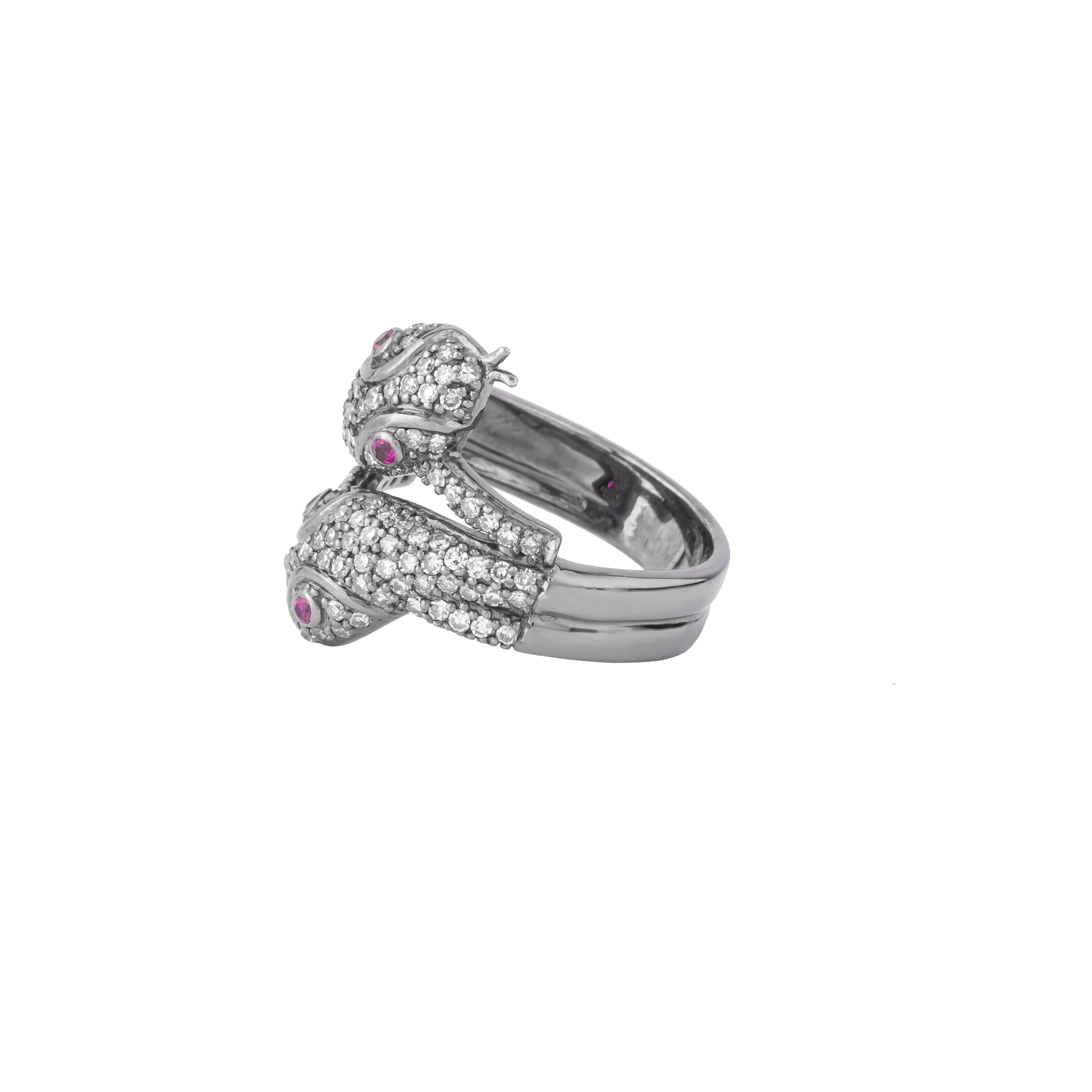The 1 Carat Diamond and Ruby Snake Fashion Ring intertwines elegance and bold design, creating a captivating piece that showcases meticulous craftsmanship. This ring features a sinuous snake motif, symbolizing transformation and rebirth, crafted
