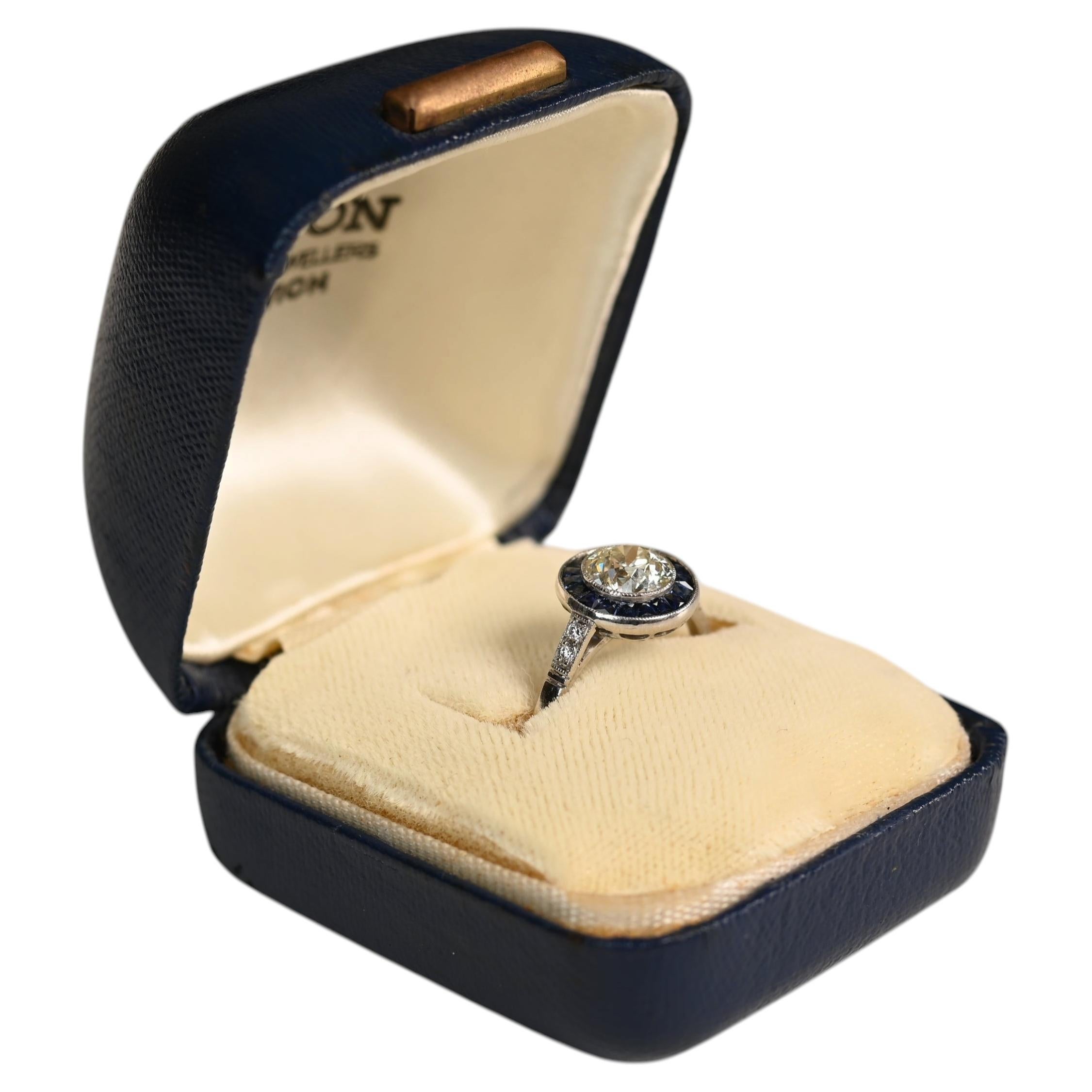 1 Carat Diamond and Sapphire Halo Ring. Old Euro K VS1 Platinum Engagement Ring