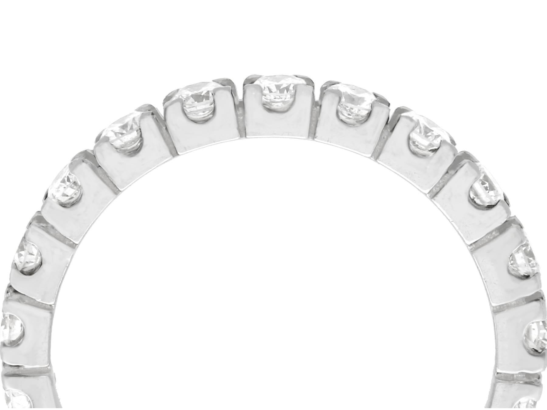 A stunning 1 carat diamond and 15 karat white gold full eternity ring; a part of our diverse collection of vintage jewelry estate jewelry.

This fine and impressive vintage eternity band ring has been crafted in 15k white gold.

This full white gold