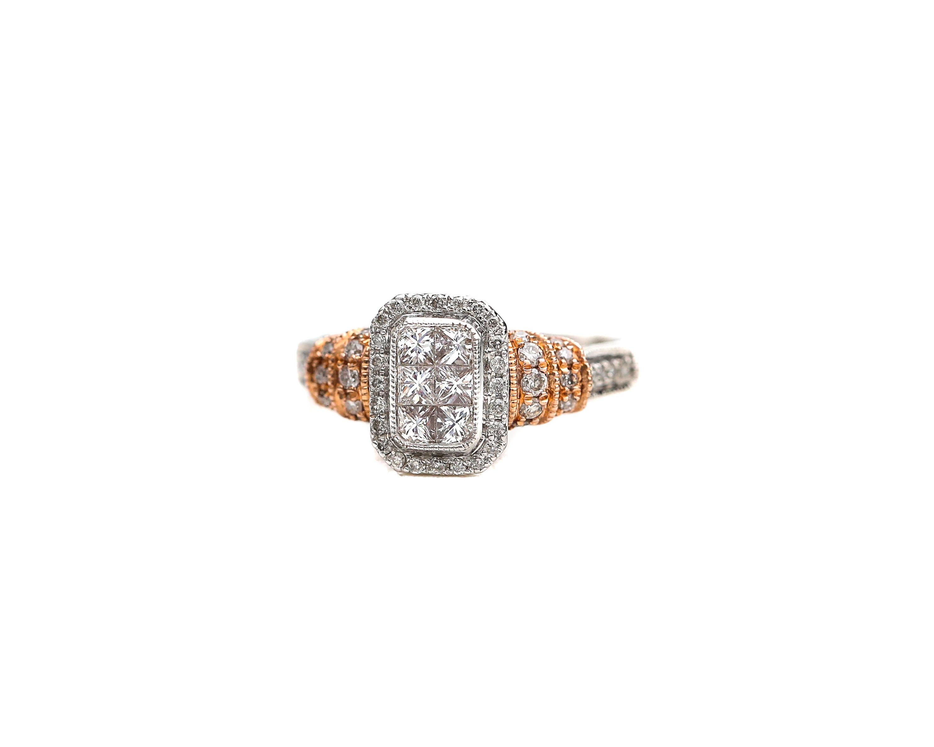 14 Karat White Gold Rose Gold Two Tone Ring from the 2000s
Featuring 1 Carats of Diamonds, G Color, VS1 Clarity 
Modern Design made by Designer Michael Beaudry 

Ring Details:
Metal: 14 Karat Gold (Rose and White)
Weight: 4.15 grams
Size: 6 (can be