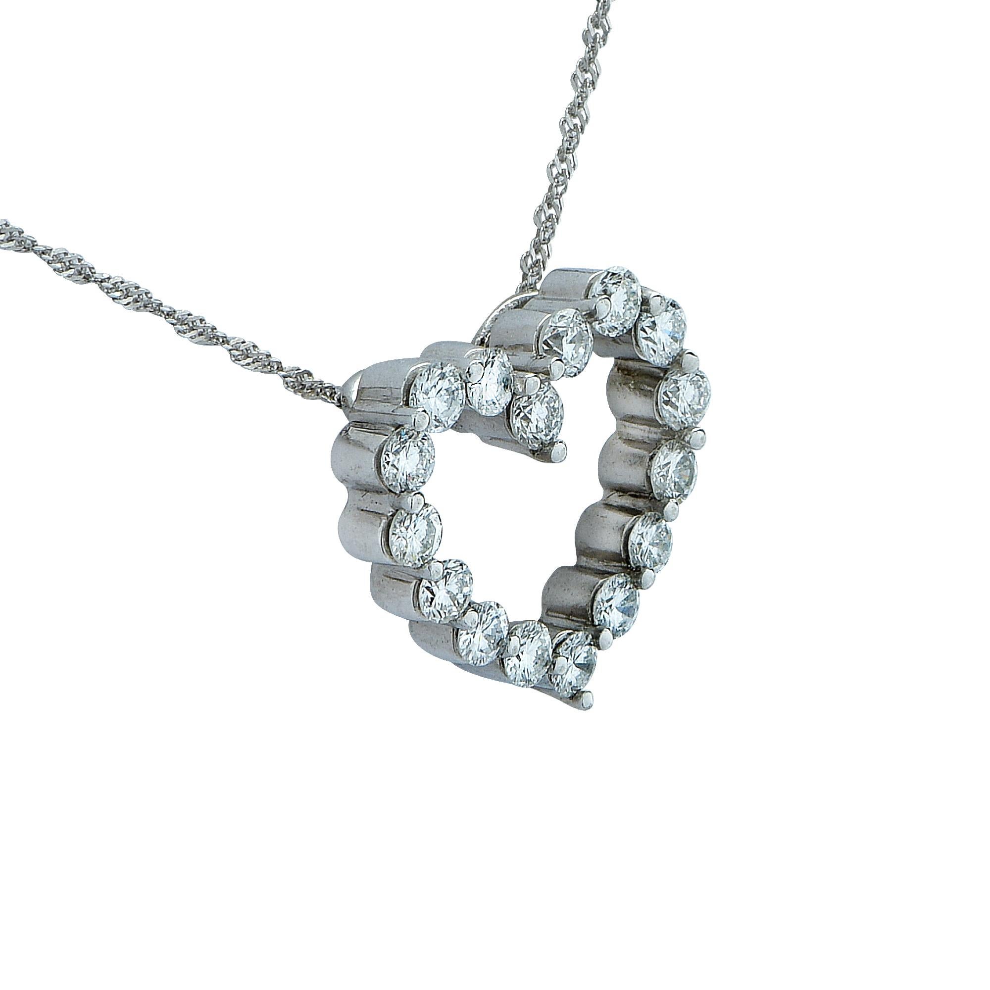 Platinum necklace featuring an open-heart shaped pendant adorned with 16 round brilliant cut diamonds weighing approximately 1 carat total, G color SI1-2 clarity, suspended from a 1mm platinum rope chain measuring 17 inches in length. The delightful