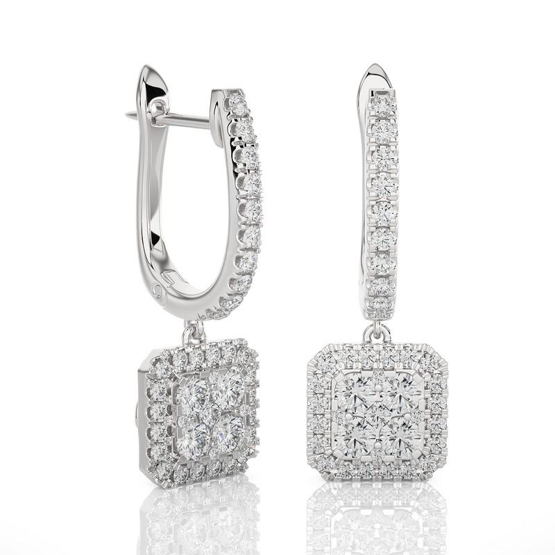 The Moonlight Cushion Cluster Lever Back Earrings are a radiant masterpiece, crafted from 3.41 grams of 14K white gold. These earrings showcase a stunning cluster of 78 excellent round diamonds, totaling 1 carats. The design is both elegant and