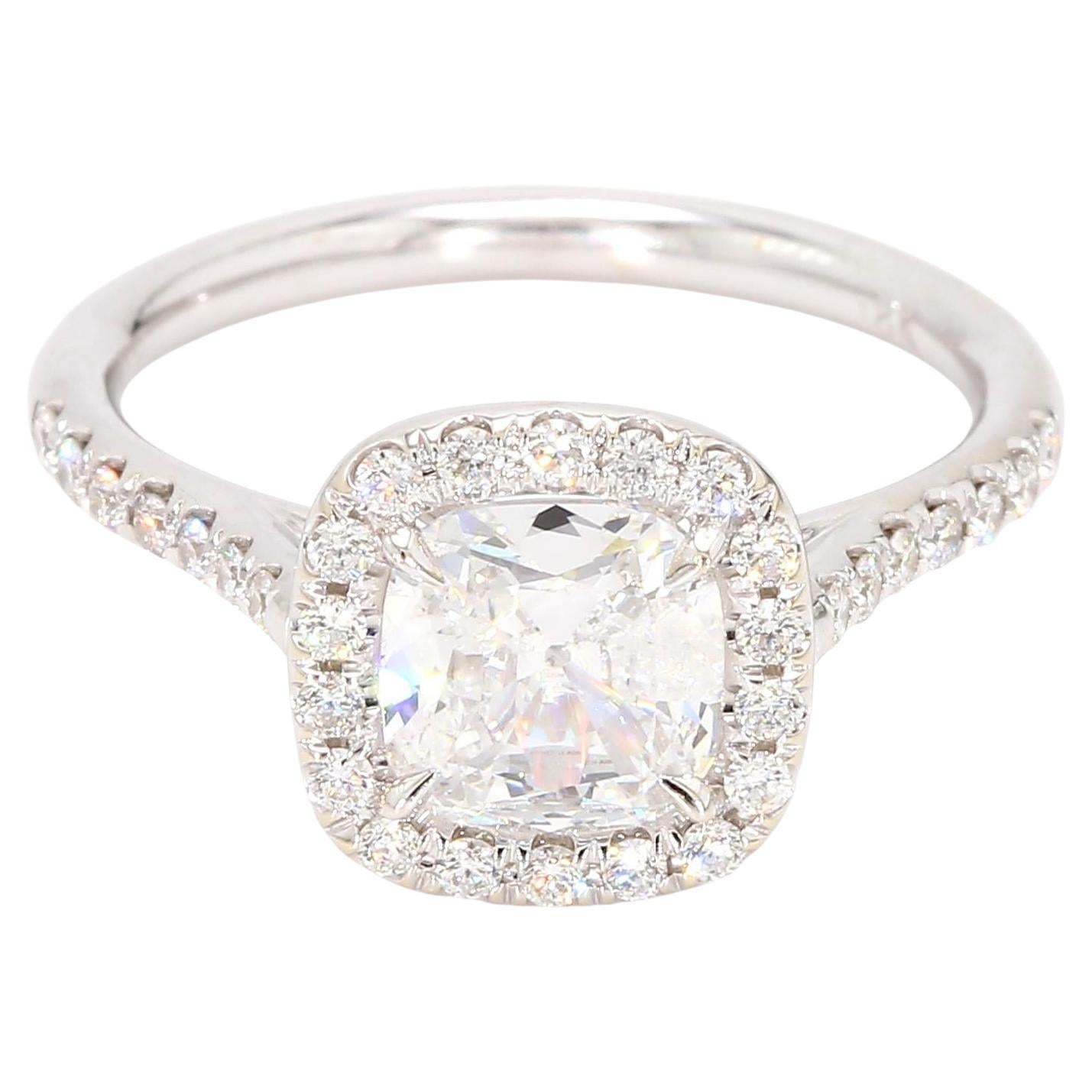 1 Carat Diamond on 18KT White Gold Mounting with Diamond Halo