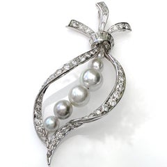 1 Carat Diamond Ribbon Pendant in Platinum with Silver-Blue Akoya Pearls