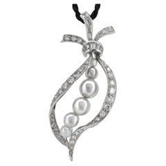 1 Carat Diamond Ribbon Pendant in Platinum with Silver-Blue Akoya Pearls