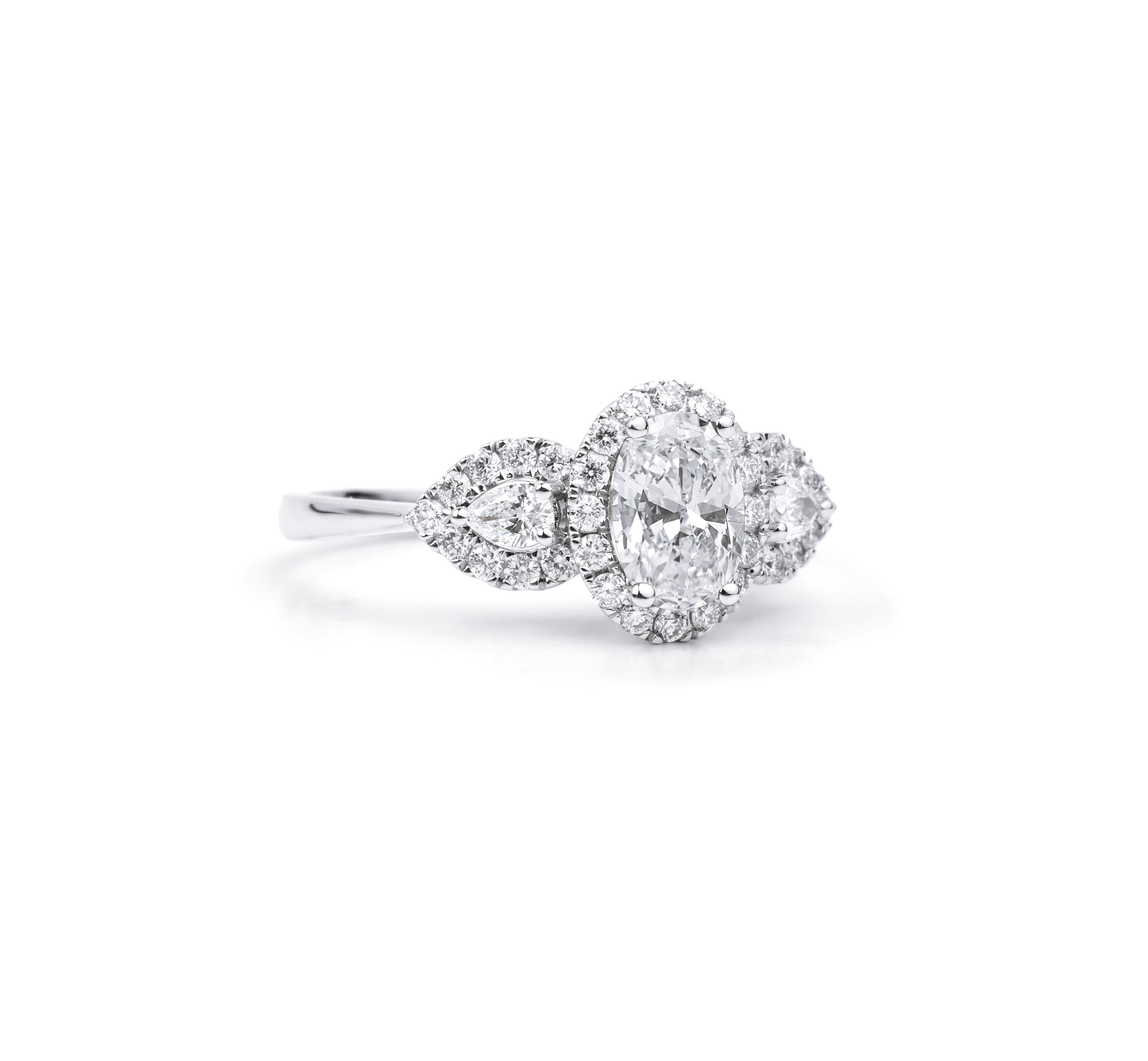 Art Deco GIA Report Certified 1 Carat E VS Oval Cut Diamond Halo Engagement Cocktail Ring For Sale