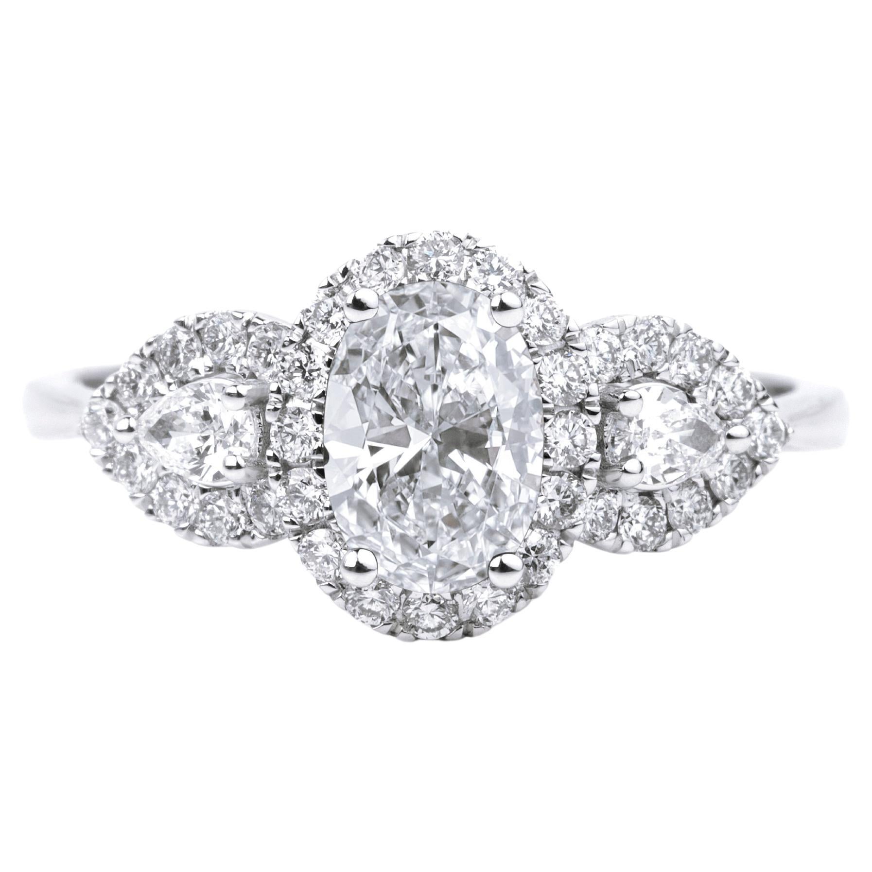 GIA Report Certified 1 Carat E VS Oval Cut Diamond Halo Engagement Cocktail Ring For Sale