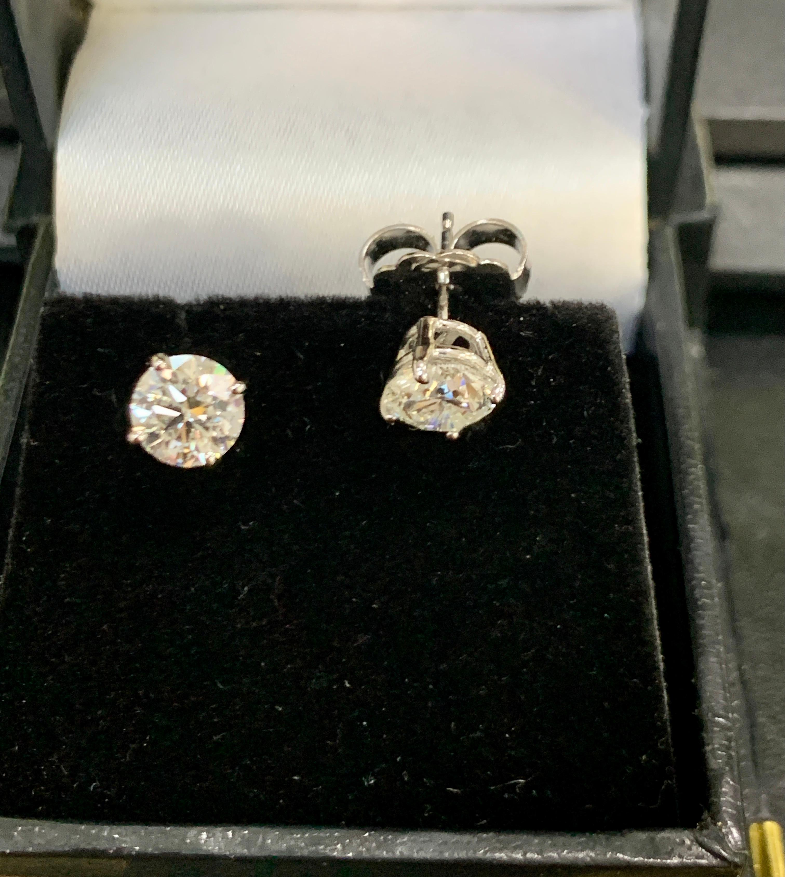 one carat each diamond earrings