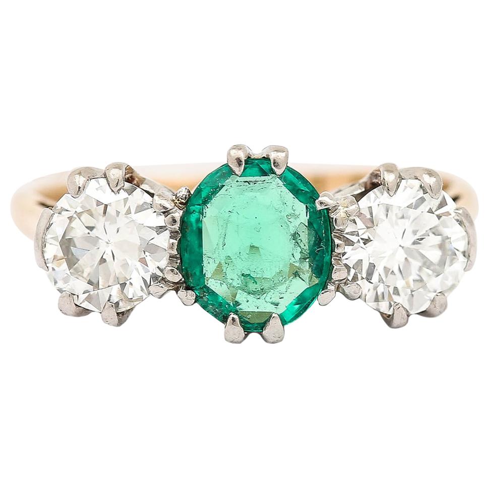 1ct Emerald and Diamond 1.50ct Three-Stone Ring 18k Yellow Gold and Platinum